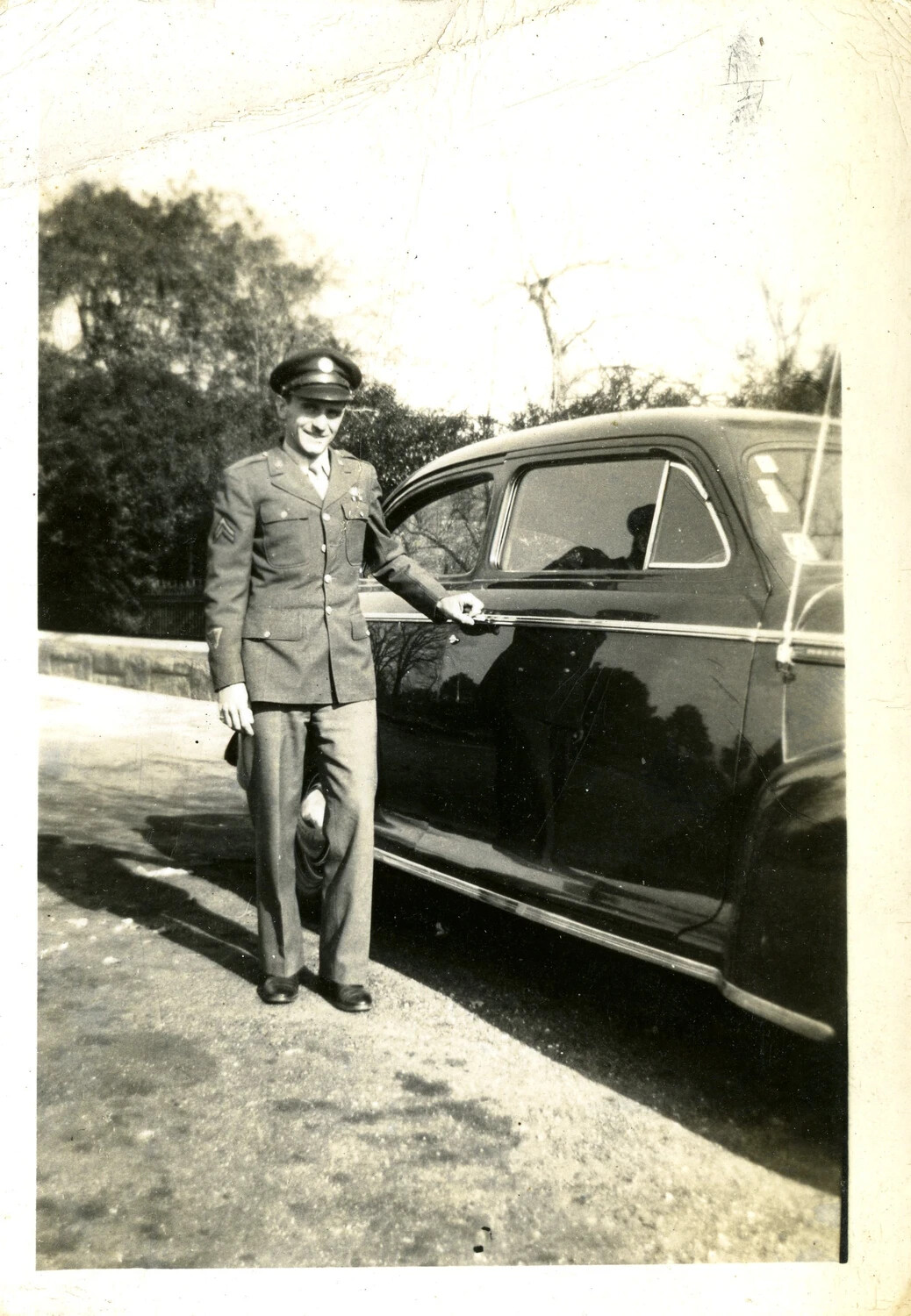 Soldier in Class A Dress Uniform Beside Automobile