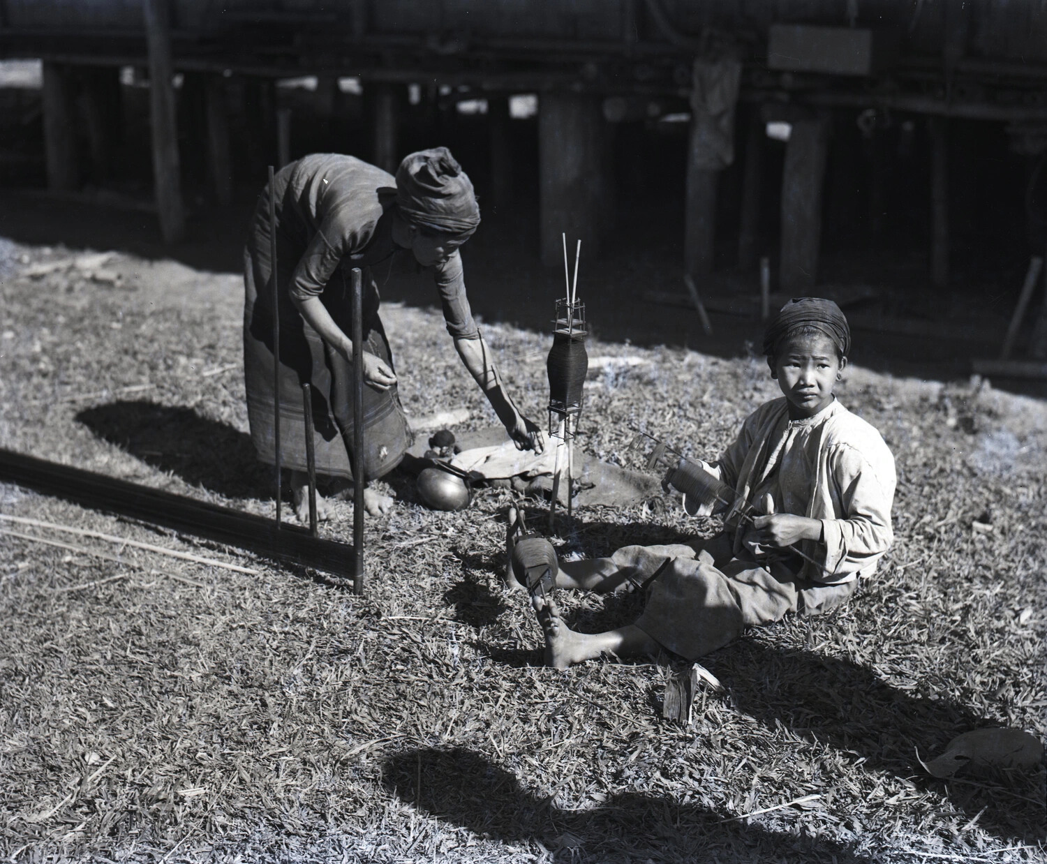 Village Woman and Boy Winding Thread, China-Burma-India Theater, World War II