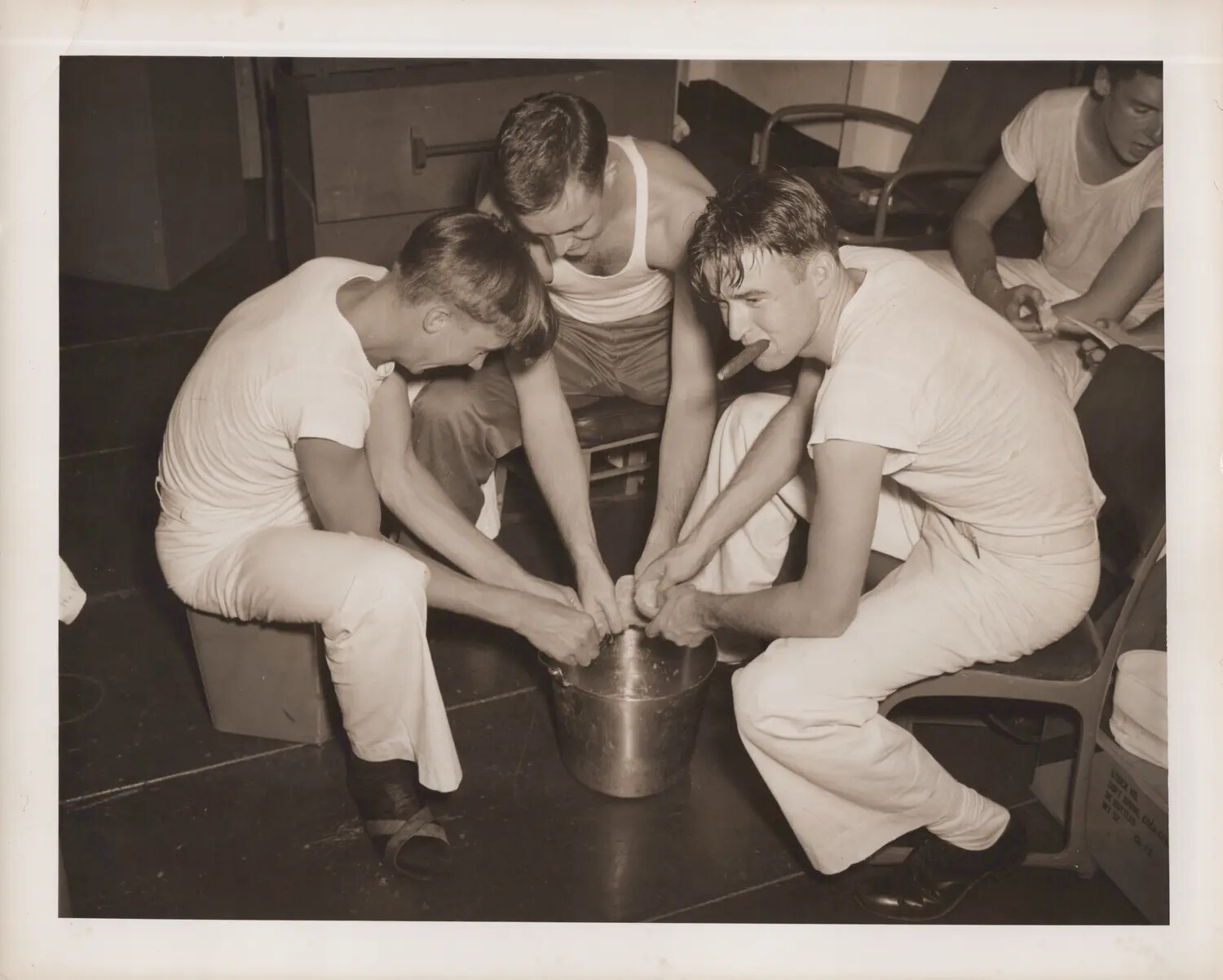 Sailors Gathered Around Bucket Performing Mess Duty, WWII Era