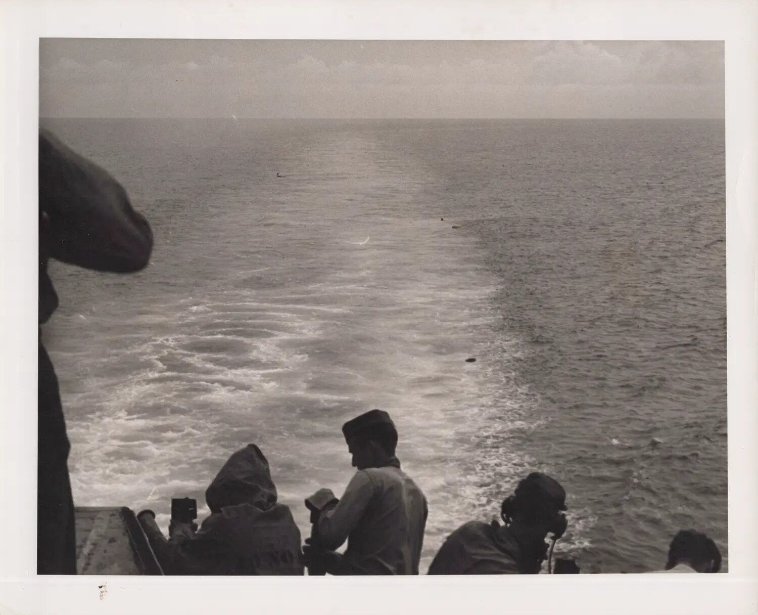 Lookouts on Escort Carrier Fantail Observing the Ship's Wake, World War II