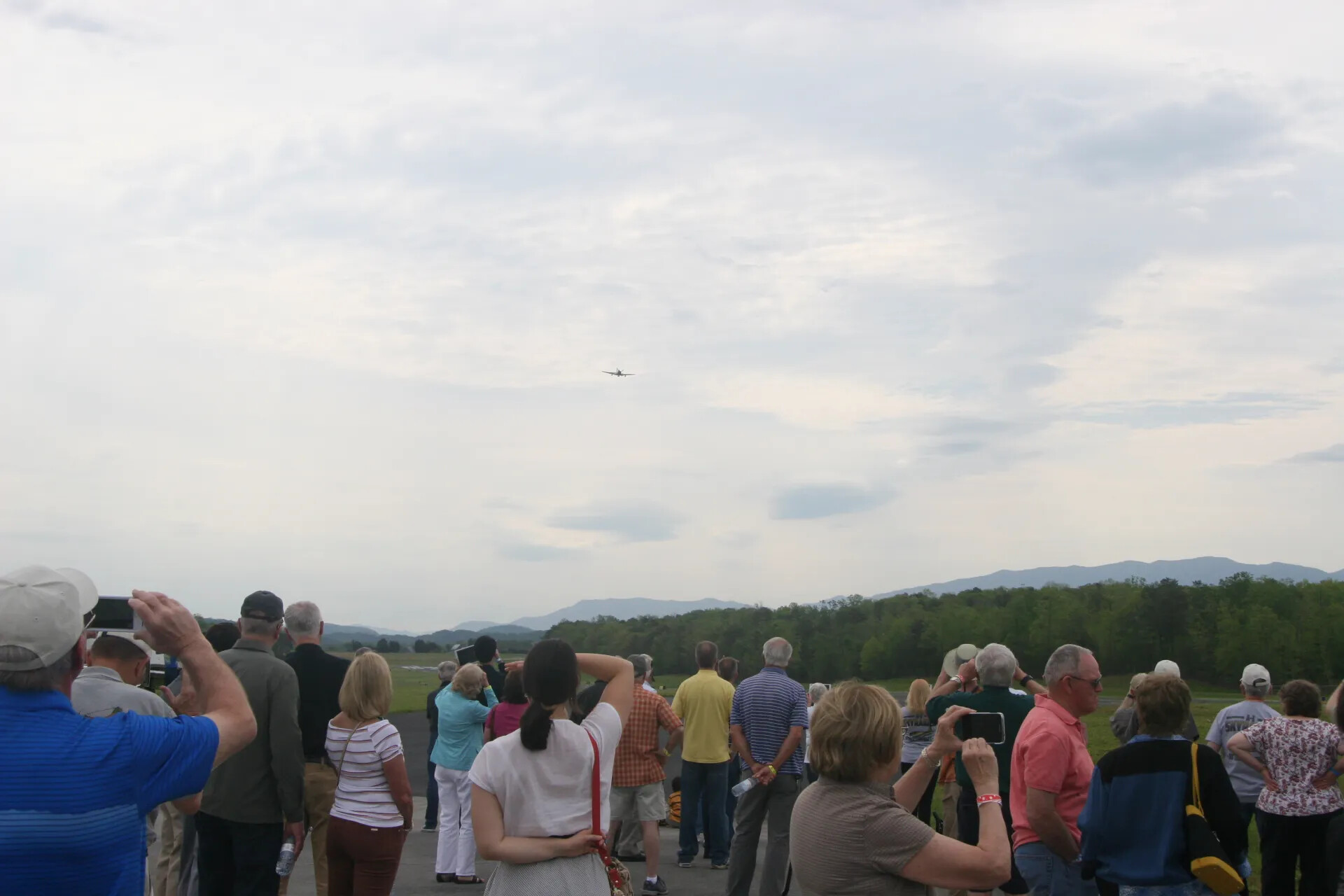 Spectators Watch A-1 Skyraider Flyover, Operation Tailwind Commemorative Event, 2016