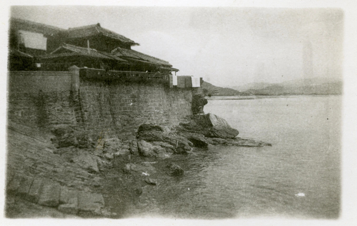 Stone Seawall and Waterfront Buildings, Japanese Coastal Town