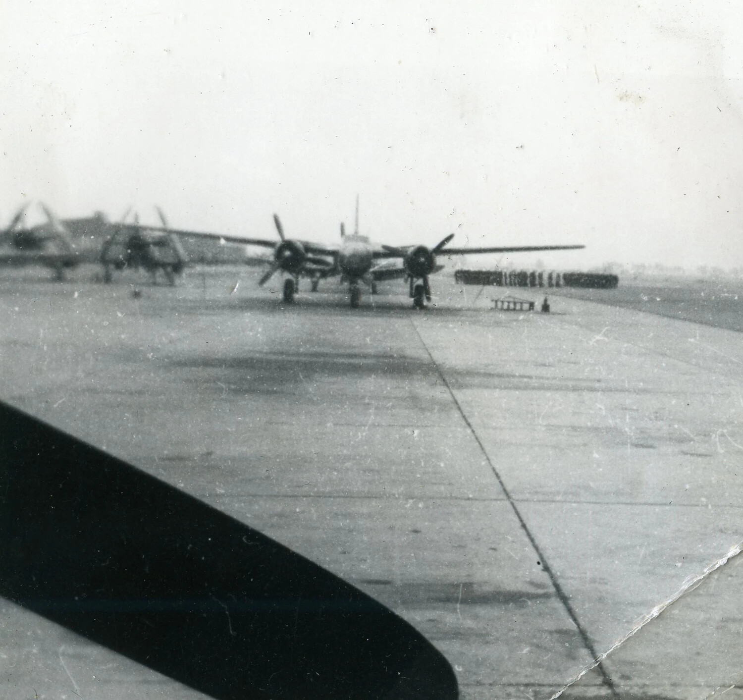 Twin-Engine Military Aircraft on Airfield Ramp, 1945 Marine Aviation Album