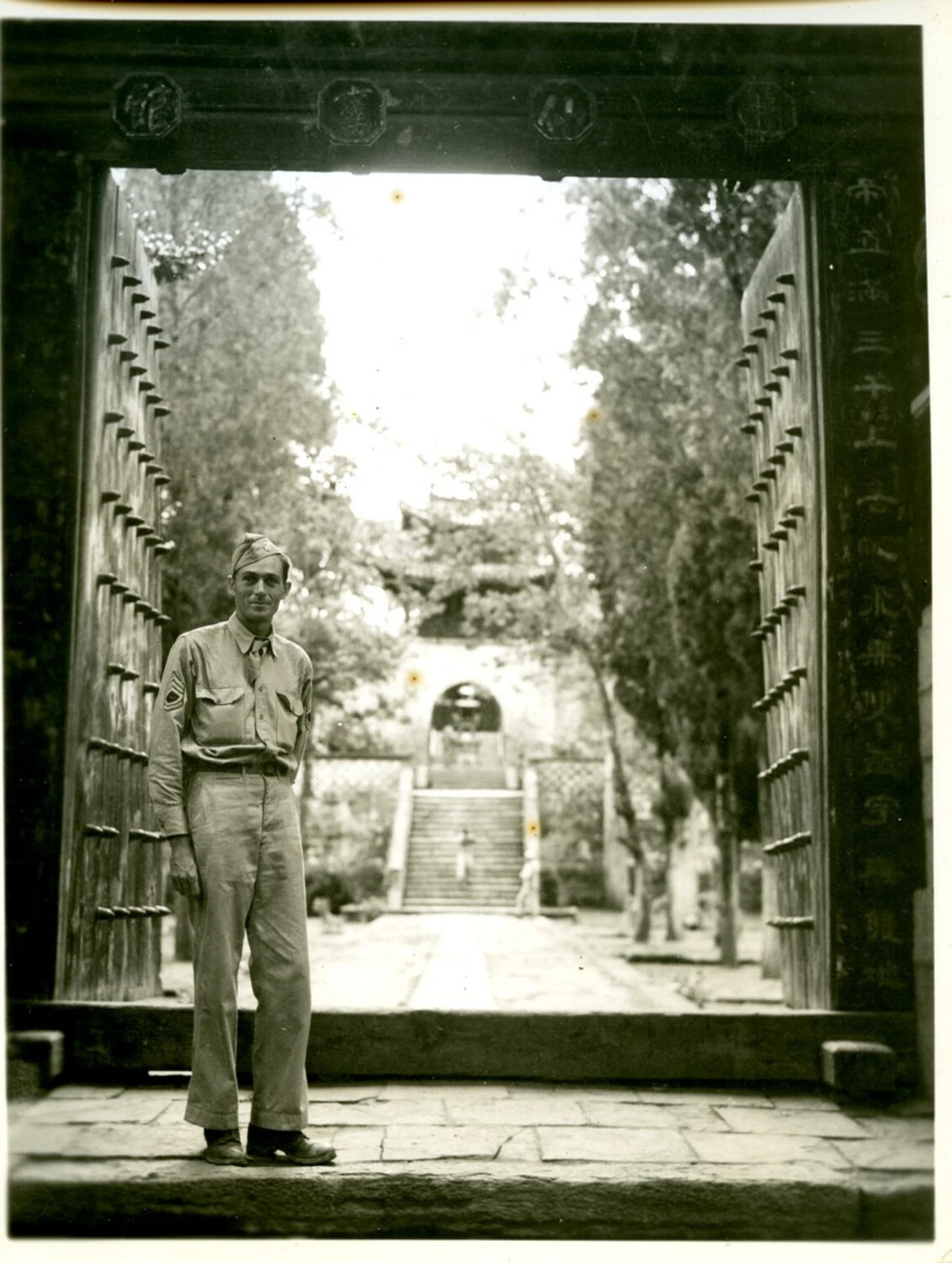 U.S. Army NCO at Temple Gateway, China-Burma-India Theater, WWII Era