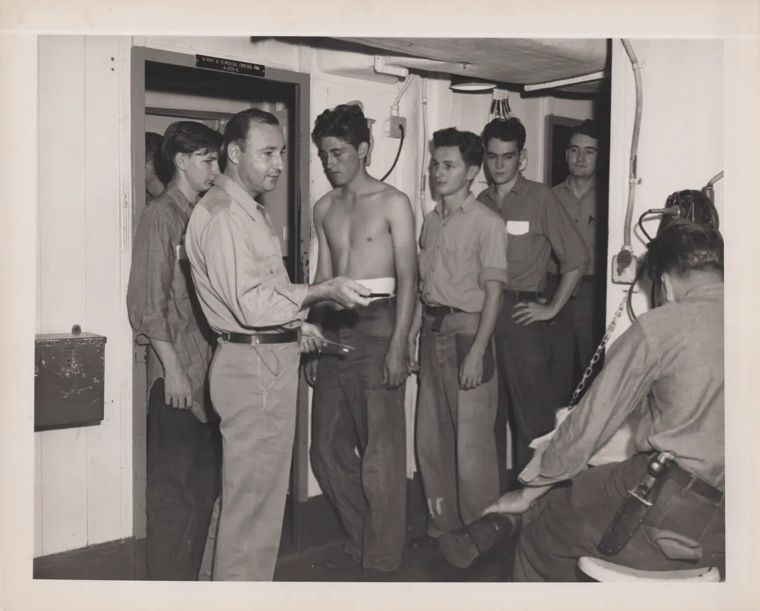 Sailors Awaiting X-Ray Examination Aboard Ship, WWII