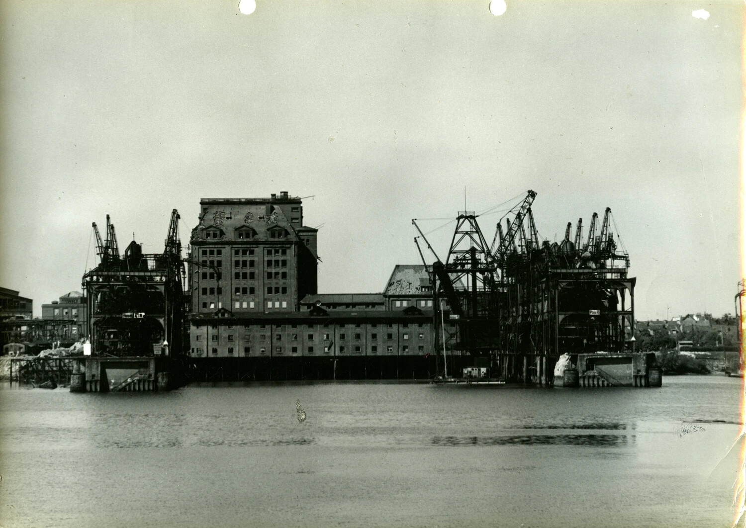 European Harbor Warehouse Complex with Dockside Cranes, WWII 11th Armored Division Collection