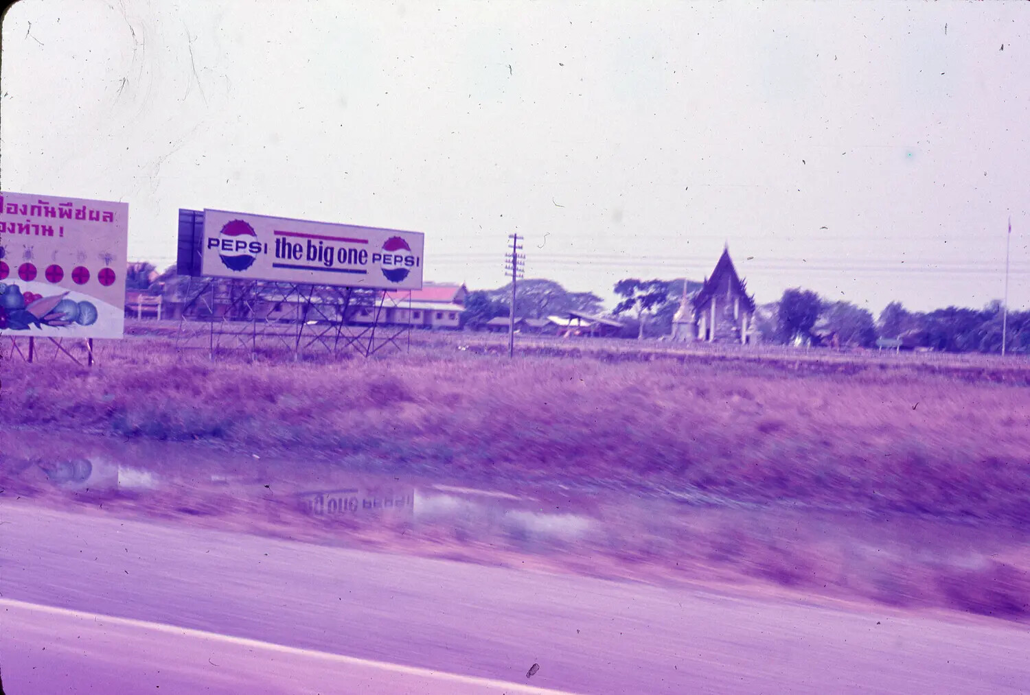 Roadside Billboards and Buddhist Temple, Thailand, Vietnam War Era