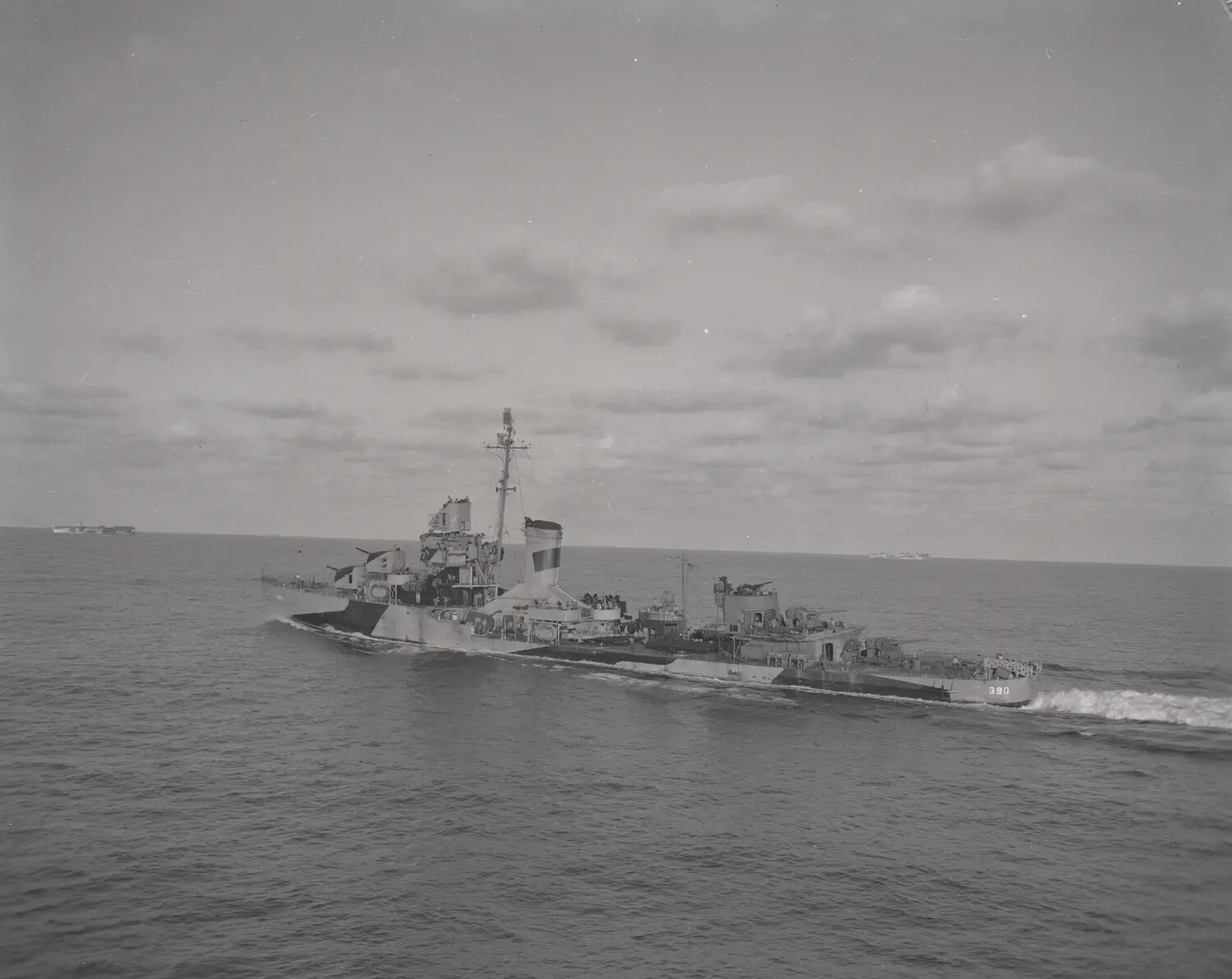 U.S. Navy Destroyer Escort DE-390 Underway, Screening a Carrier Task Unit, Pacific Theater, World War II