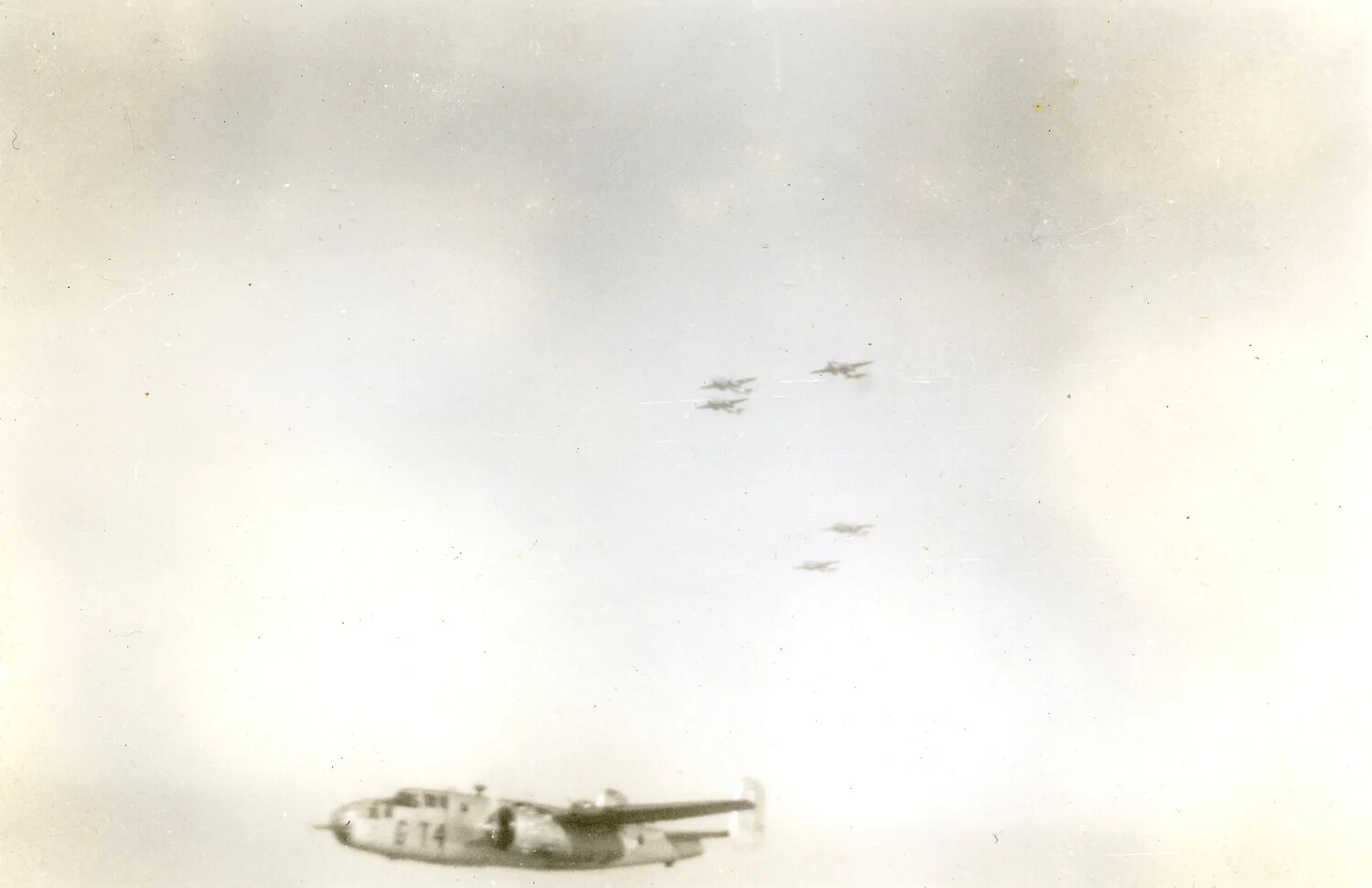 B-25 Mitchell in Formation Flight, Air-to-Air View with Additional Aircraft in Distance