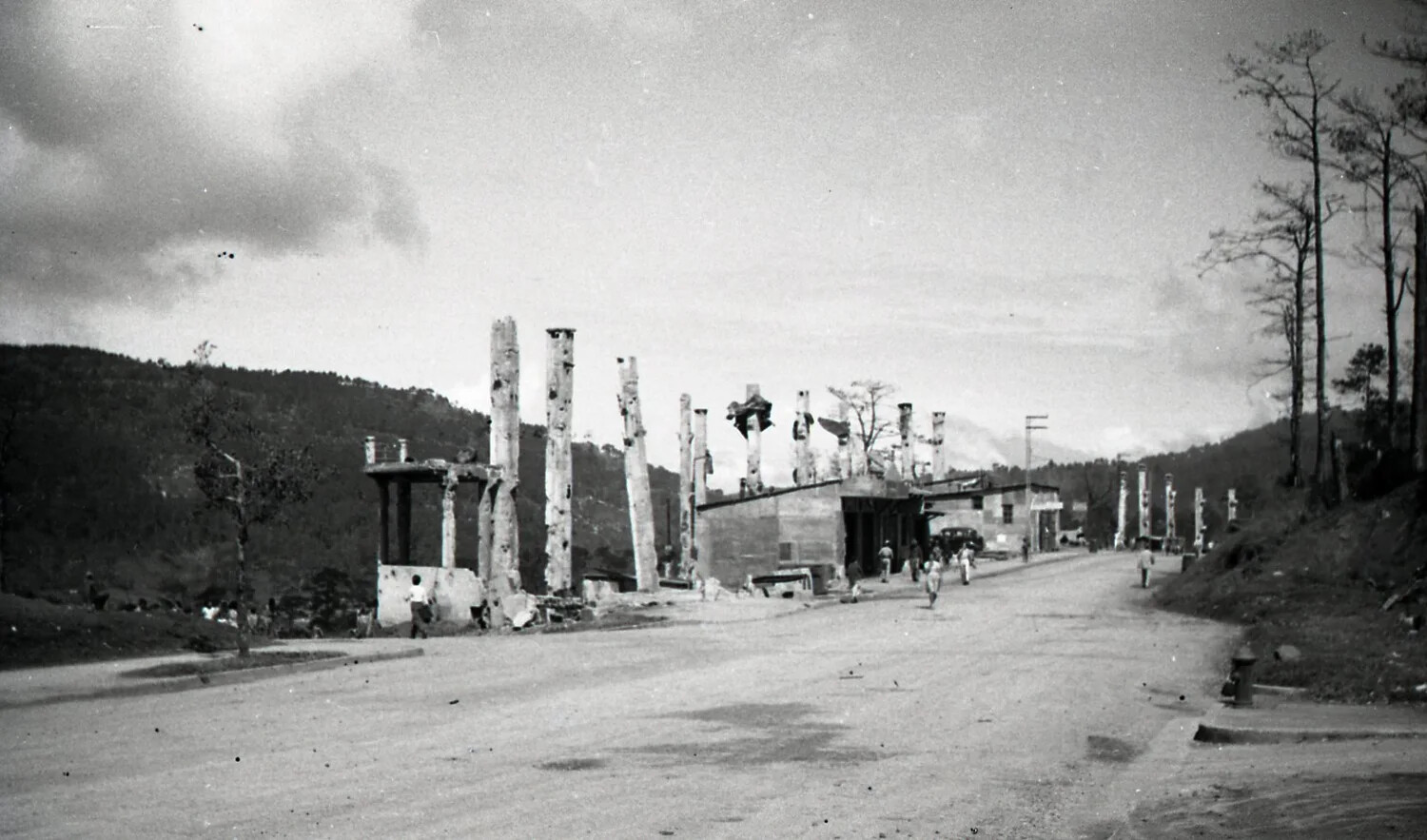 War-Damaged Town Street with Ruined Building Columns, Luzon, Philippines, WWII