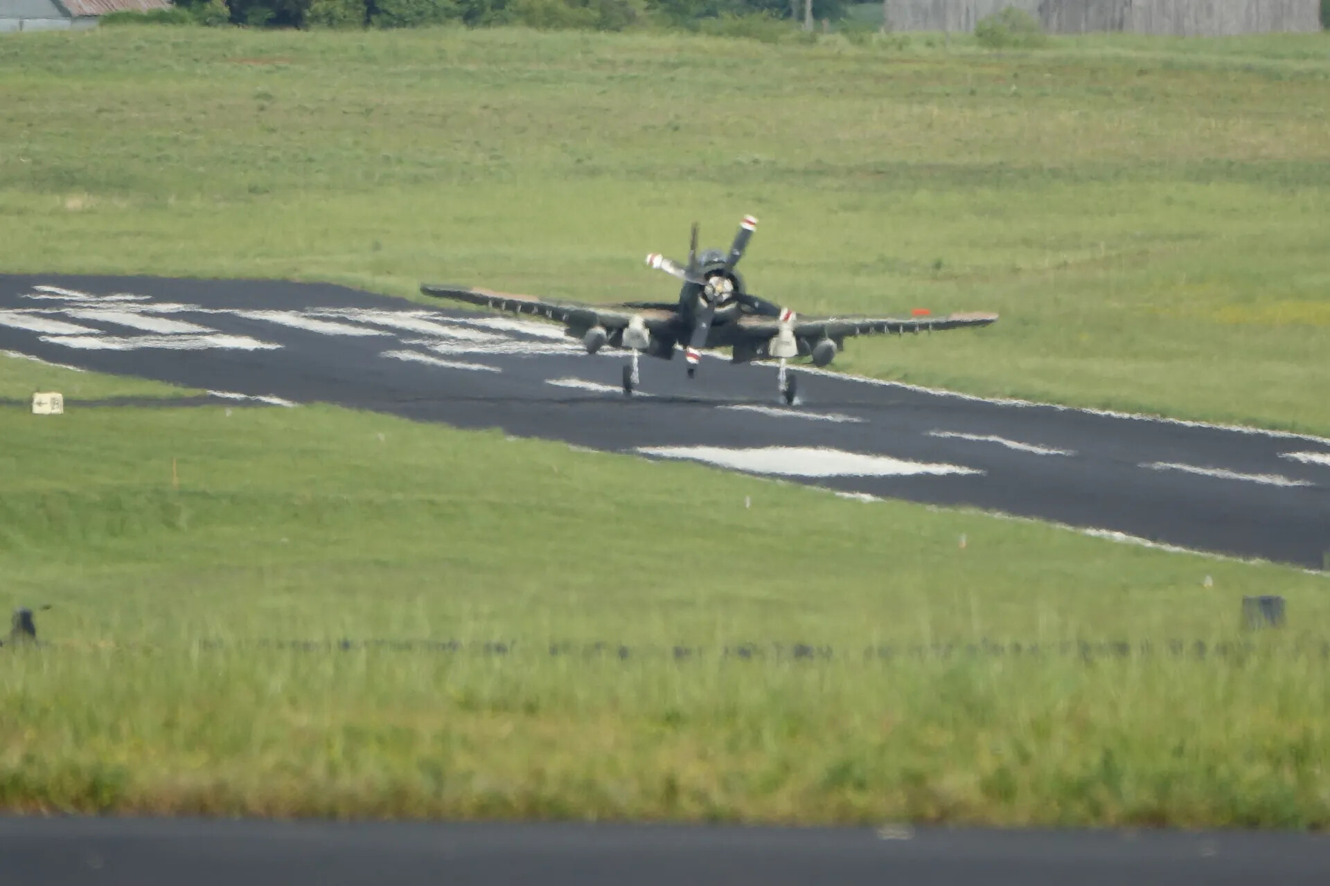 Douglas A-1 Skyraider Touching Down, Rural Airfield Event (Alternate Frame)