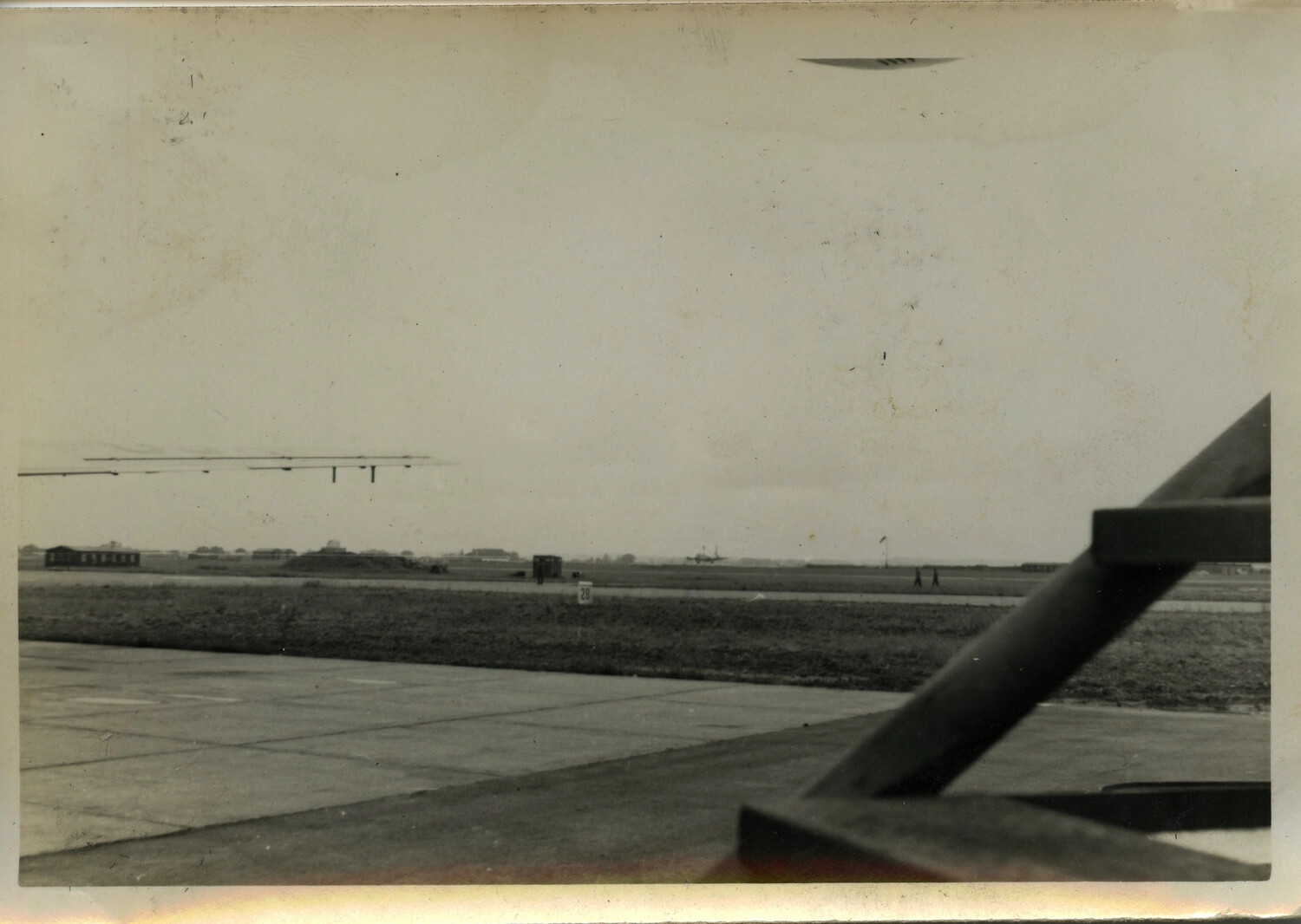 Airfield Ramp View with Aircraft Structure in Foreground, Azores/Hickam/England Ferry Route Album