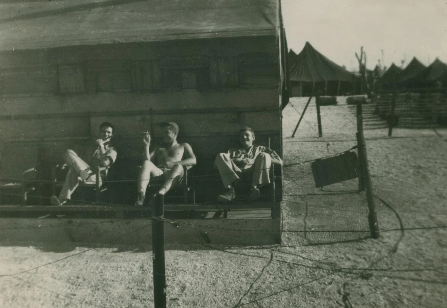 Servicemen Relaxing at Tent Camp, WWII Overseas Deployment