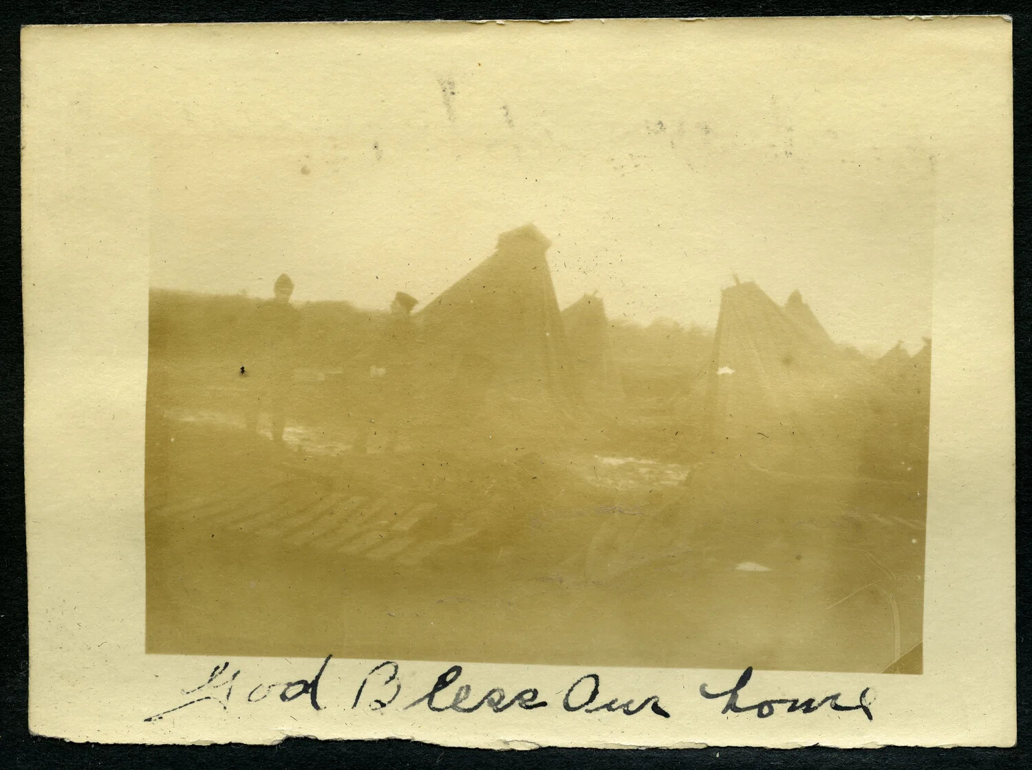 WWI-Era Photo Album Page: Pyramidal Tent Camp with Handwritten Caption "God Bless Our Home"