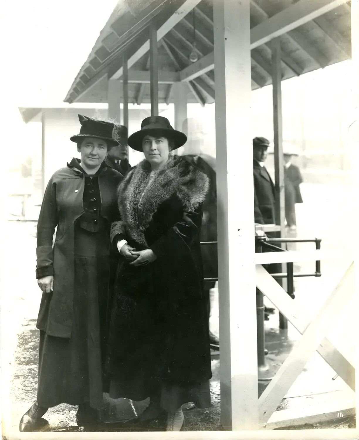 Two Women in Fur-Trimmed Coats at a Waterfront Pavilion, WWI-Era Ohio Event