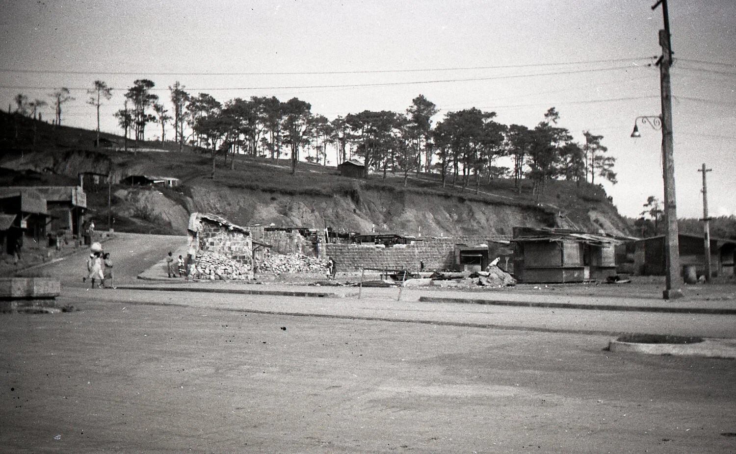 War-Damaged Town Street with Ruined Buildings, Luzon, Philippines, WWII Era