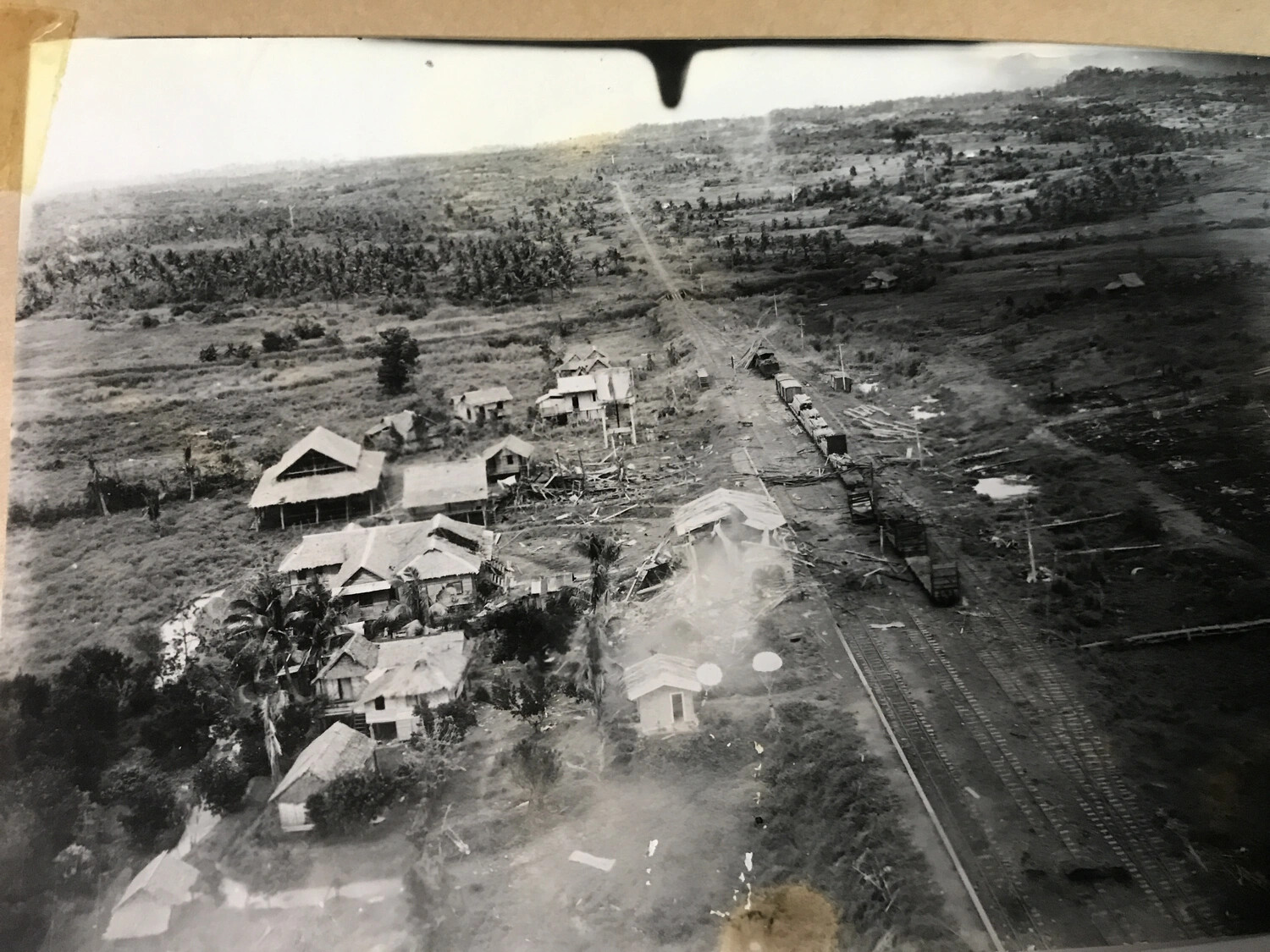 Bomb Damage Assessment Photograph of Destroyed Village and Rail Siding, Pacific Theater