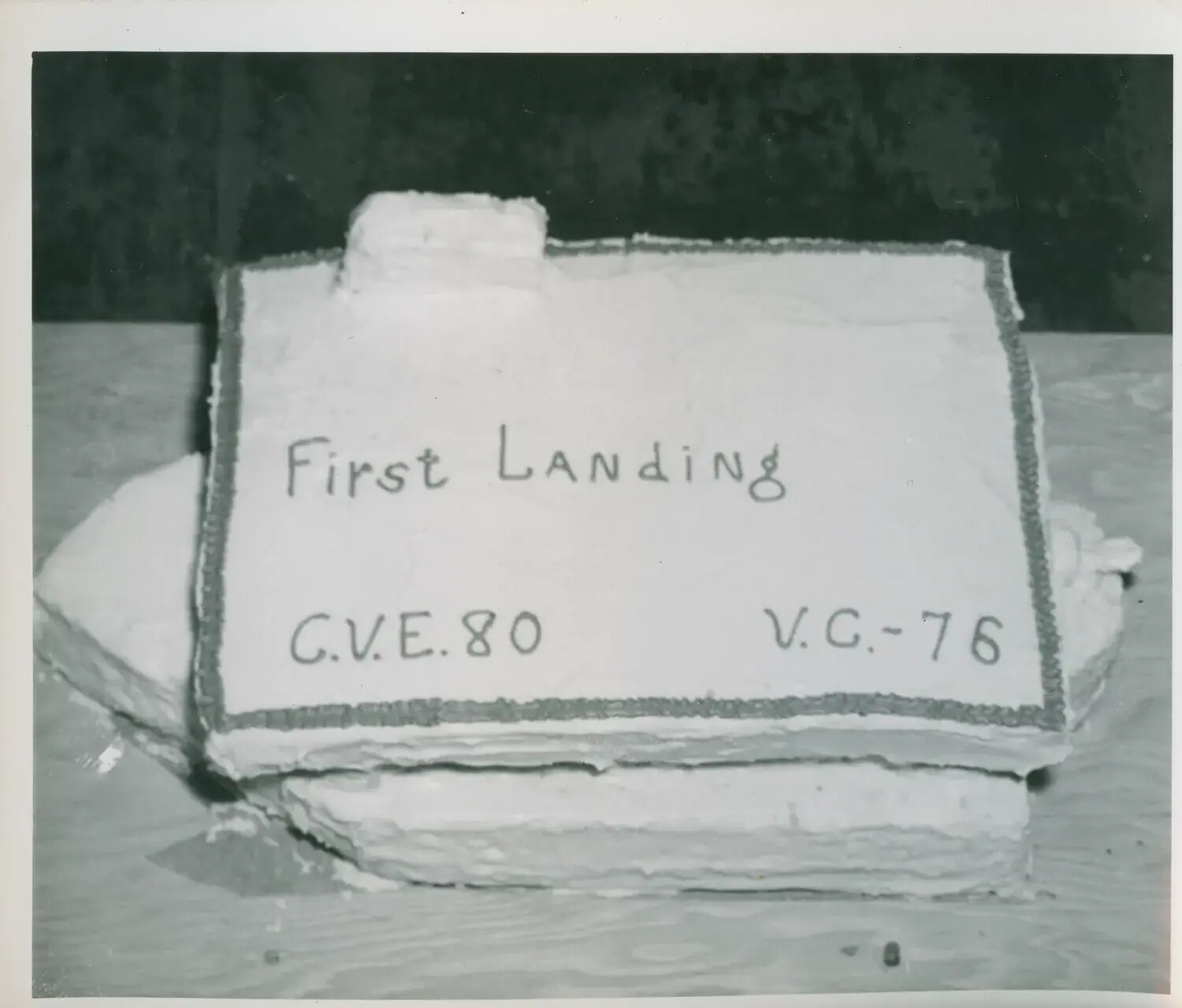 Commemorative Cake Marking 'First Landing' of VC-76 Aboard USS Petrof Bay (CVE-80)