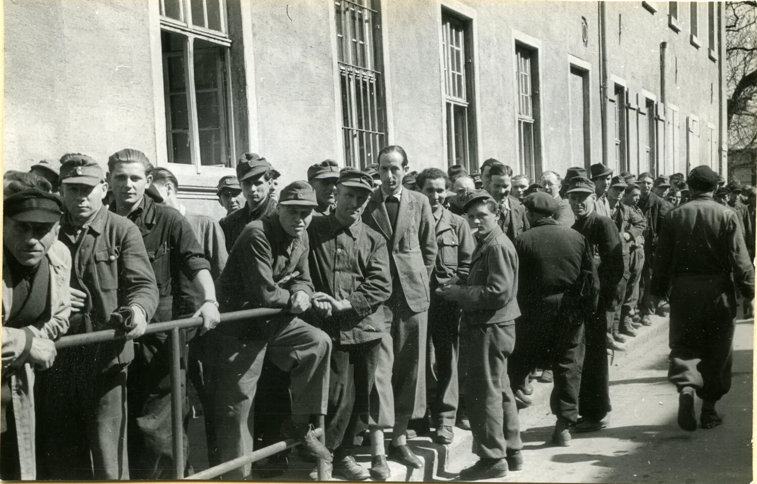 German Civilian Laborers Queued Outside Depot-Operated Mess Hall, Occupied Germany, Postwar Period (Detail View)