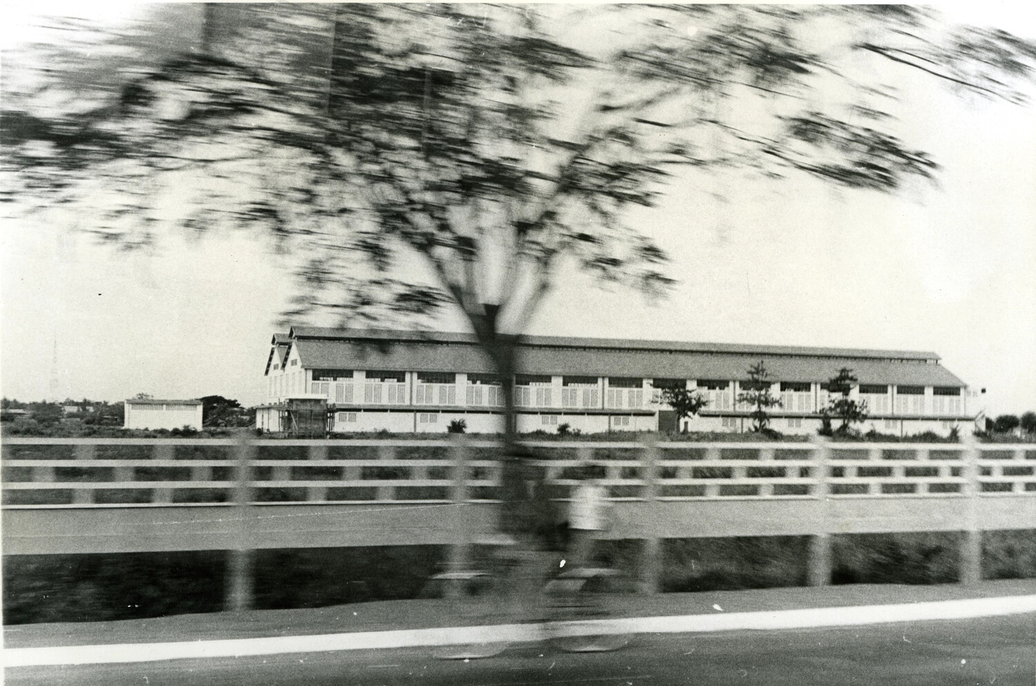 Long Warehouse or Market Building Viewed from Roadway, Phnom Penh Area, Cambodia, c. 1960s