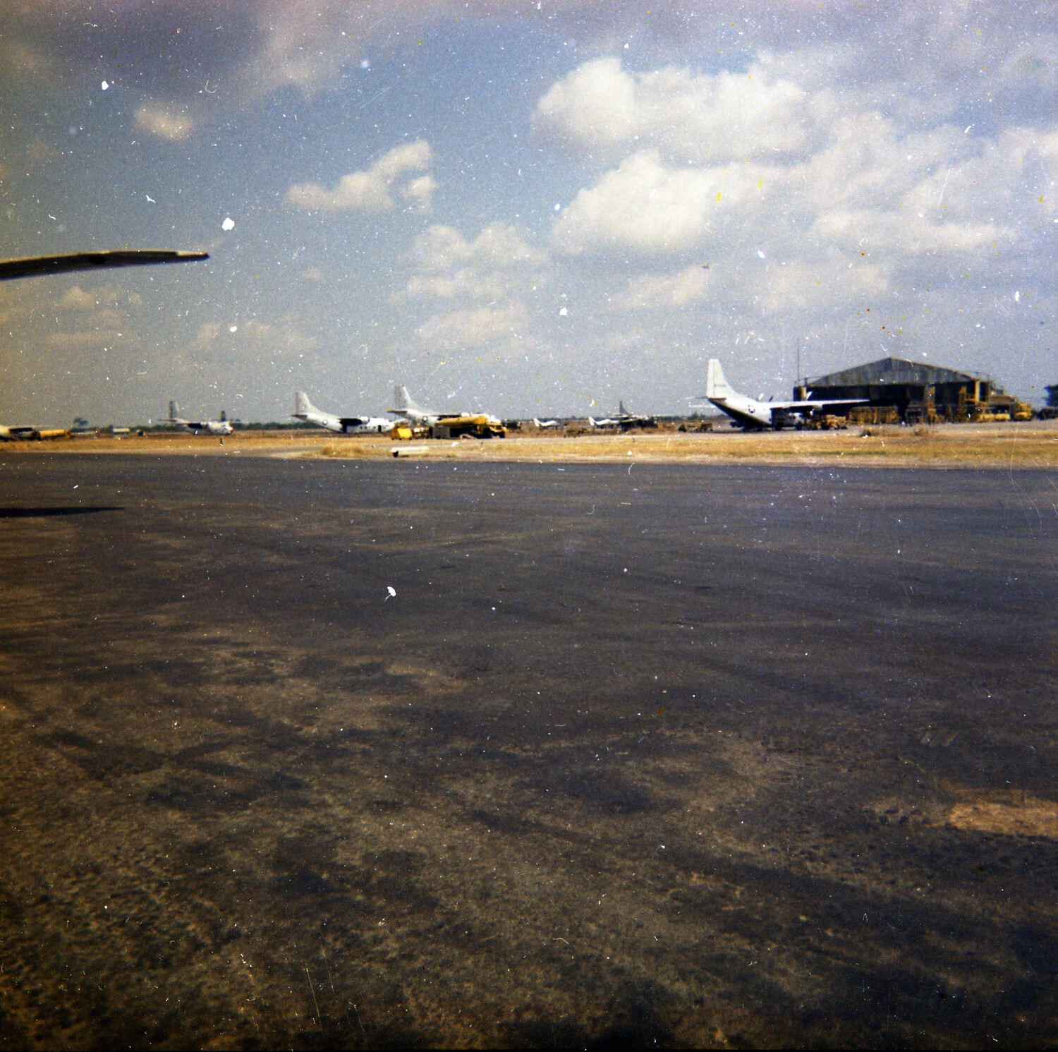 USAF Transport Aircraft on the Flight Line, South Vietnam, 1963