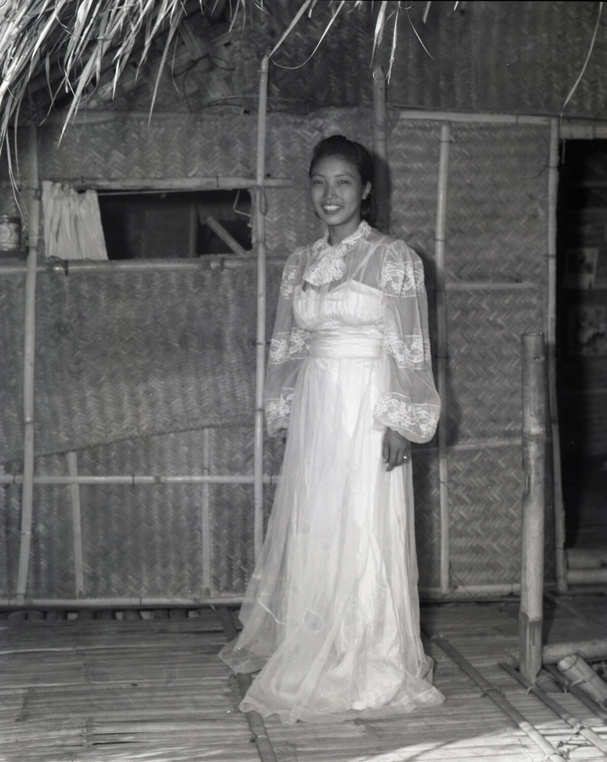 Young Woman in Formal Lace Dress on Bamboo Porch, Labeled 'Karen Church Service,' Burma, WWII Era