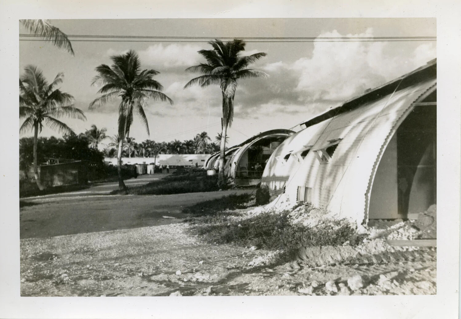 Quonset Hut Row Amid Palm Trees, Naval Air Station Agana, Guam