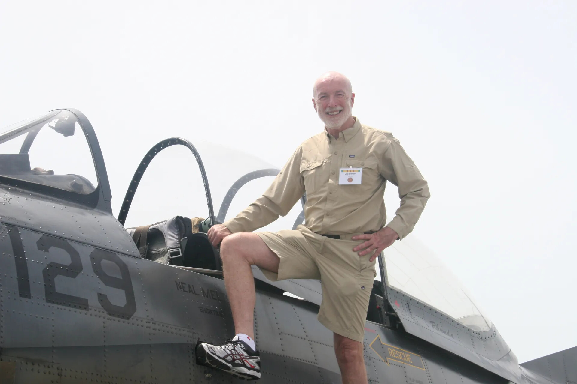 Veteran Posing on A-1 Skyraider Wing at Operation Tailwind Reunion, 2016