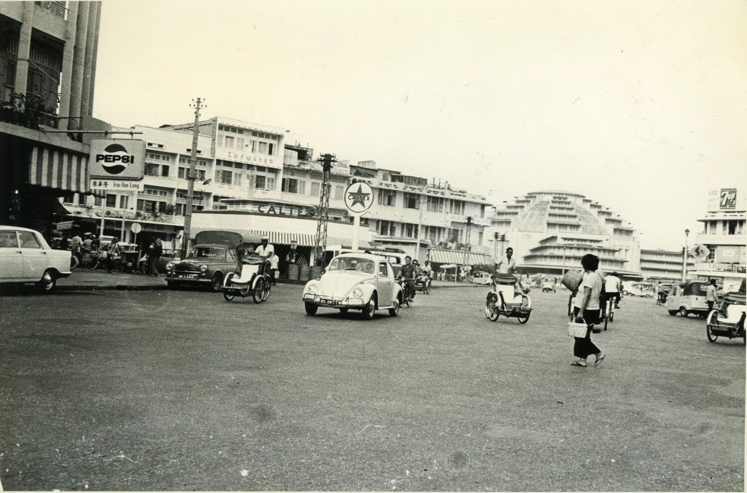 Central Market Square with Caltex Station and Street Traffic, Phnom Penh, Cambodia
