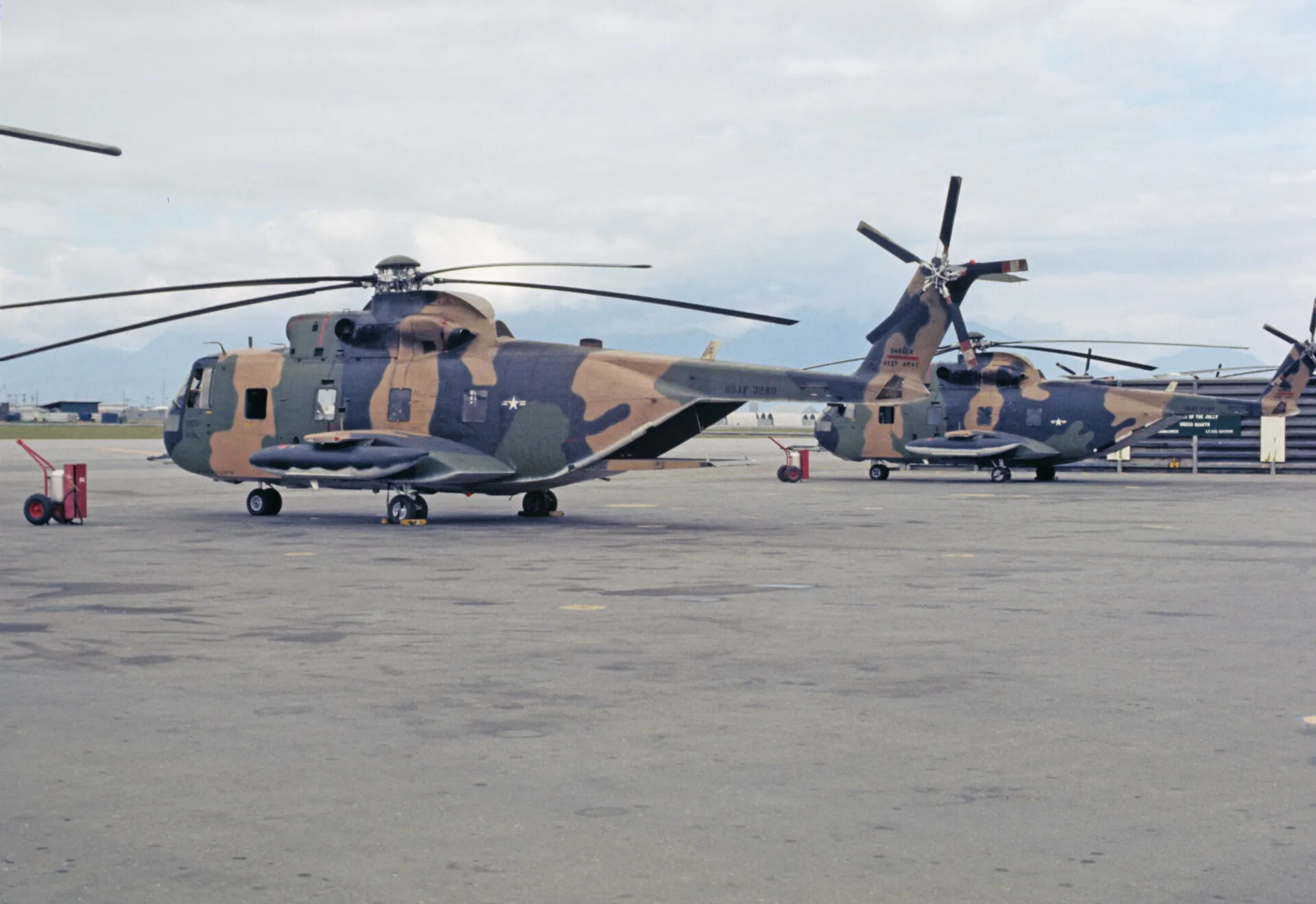 Two Sikorsky HH-3E 'Jolly Green Giant' Rescue Helicopters on Ramp, Tail Number USAF 3280