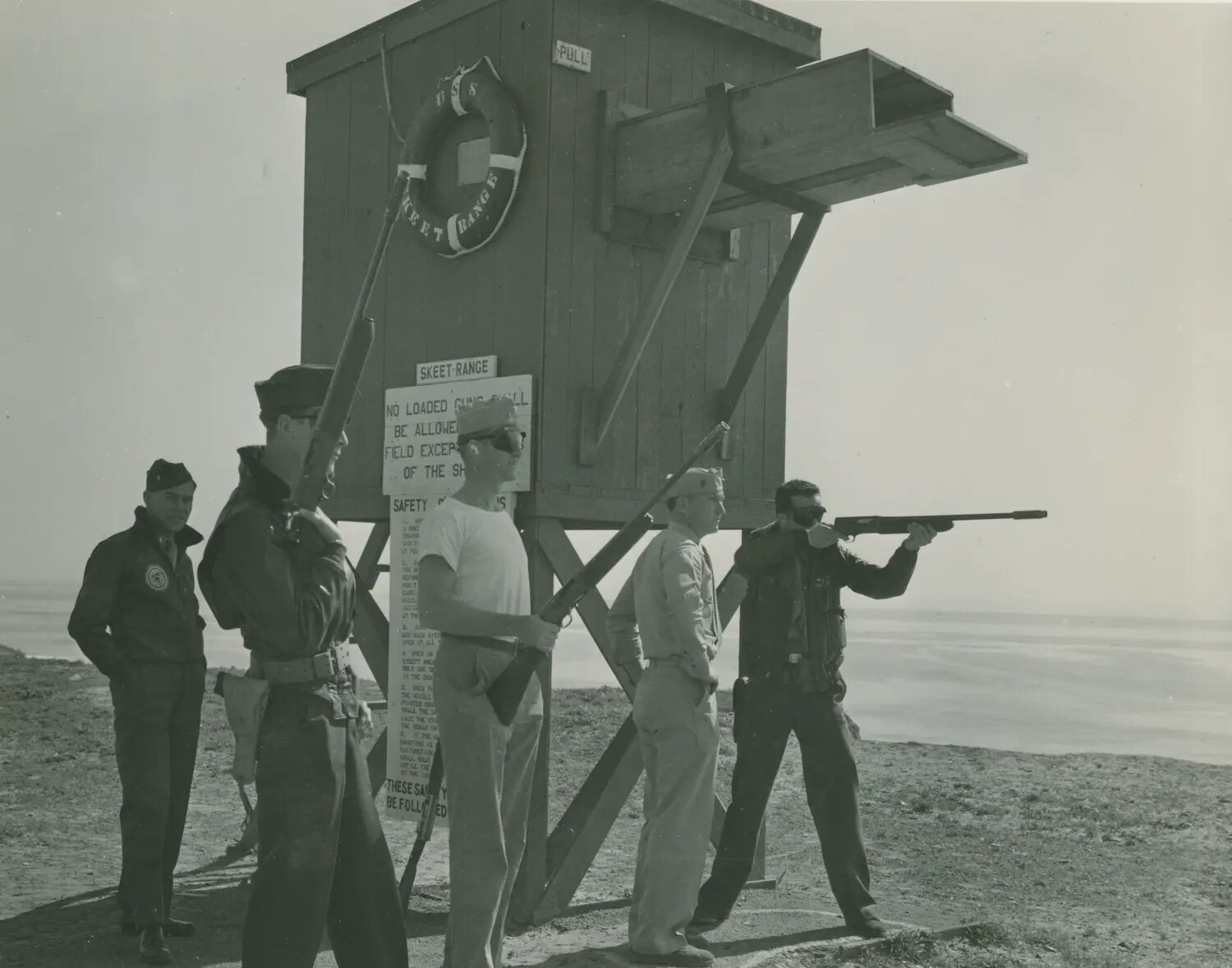 Sailors at Shipboard Skeet Range Aboard U.S. Navy Vessel