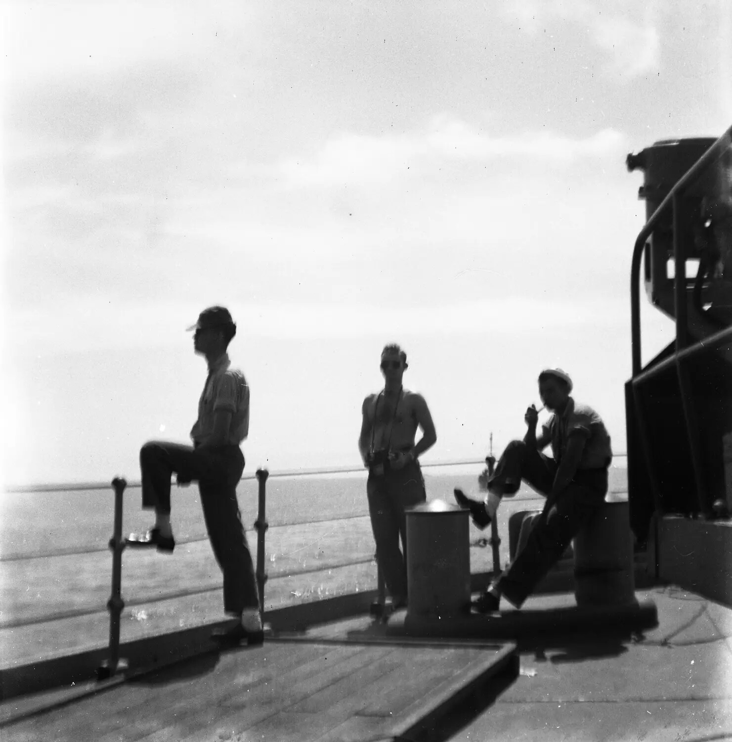 Servicemen Relaxing on Ship's Deck, Sasebo, Japan, Postwar Era