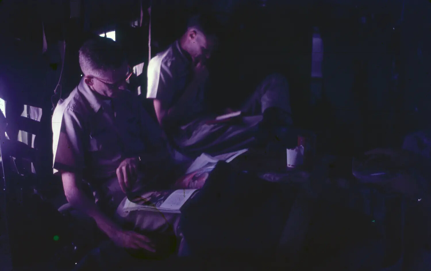 Off-Duty U.S. Air Force Airmen Reading in Barracks Quarters, Vietnam, 1965