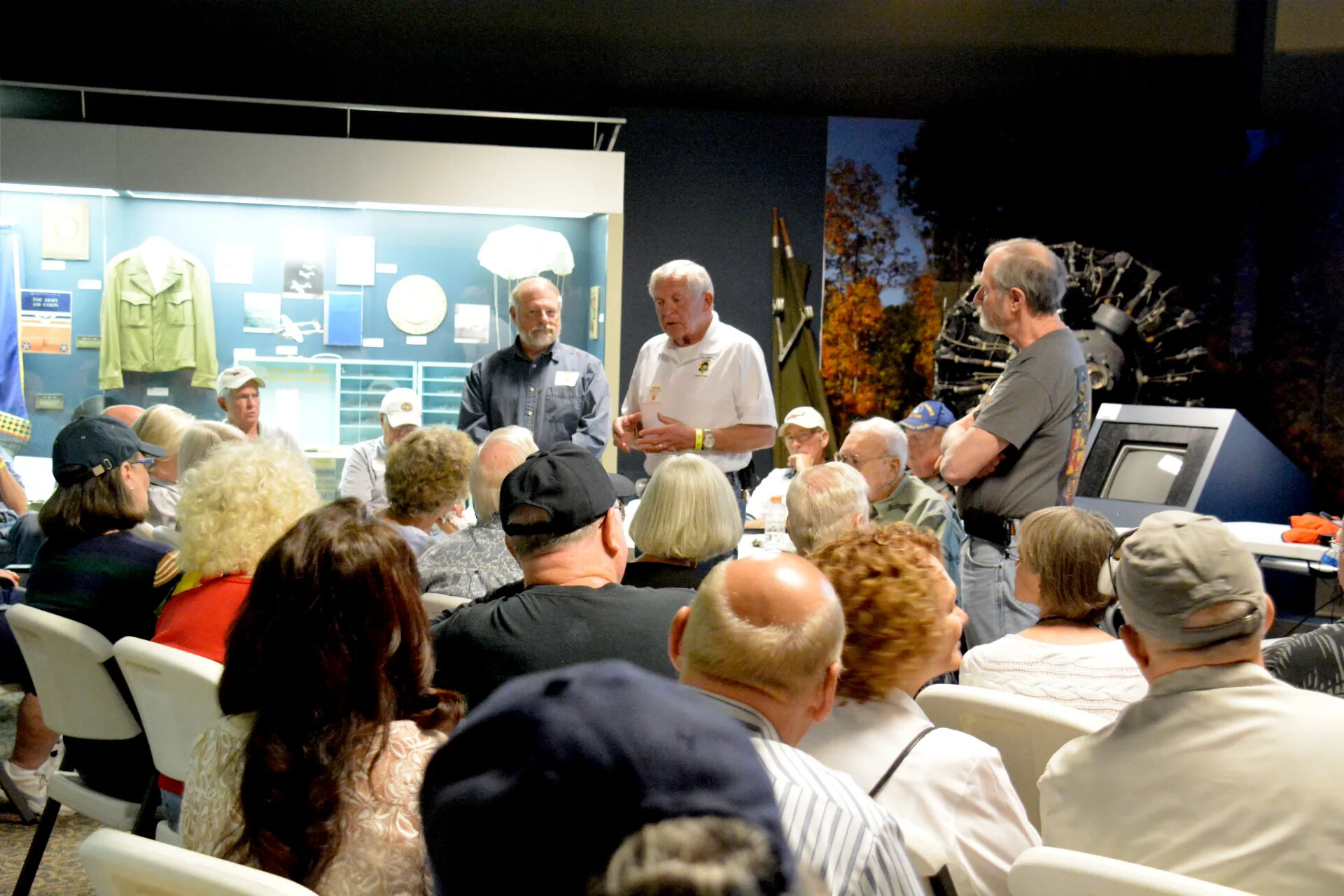 Reunion Attendees Gathered Before Museum Exhibit Case, Skyraider Association Meeting, 2 May 2015