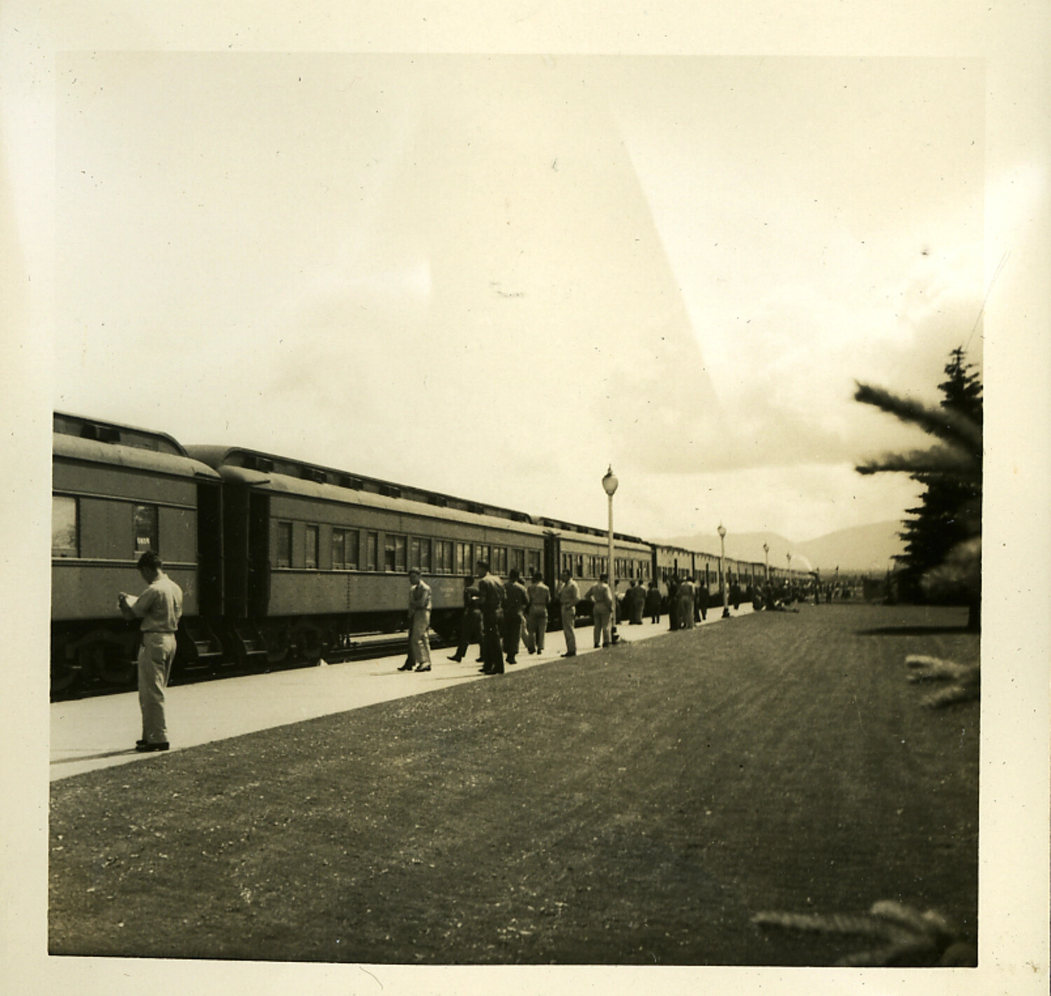 Servicemen at Rail Platform Stop, Transcontinental Journey