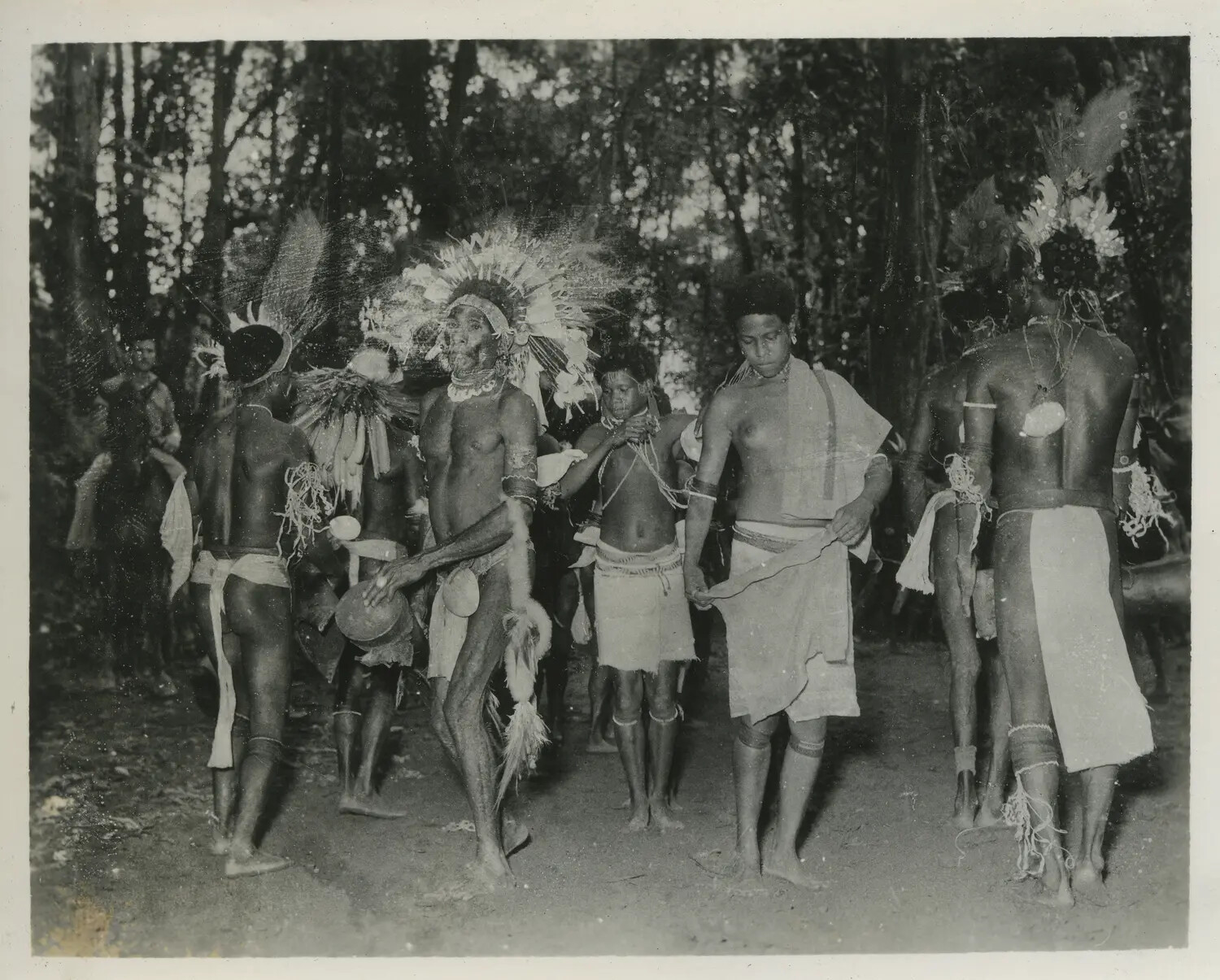 New Guinean Villagers in Ceremonial Dress and Feather Headdresses, WWII Pacific Theater