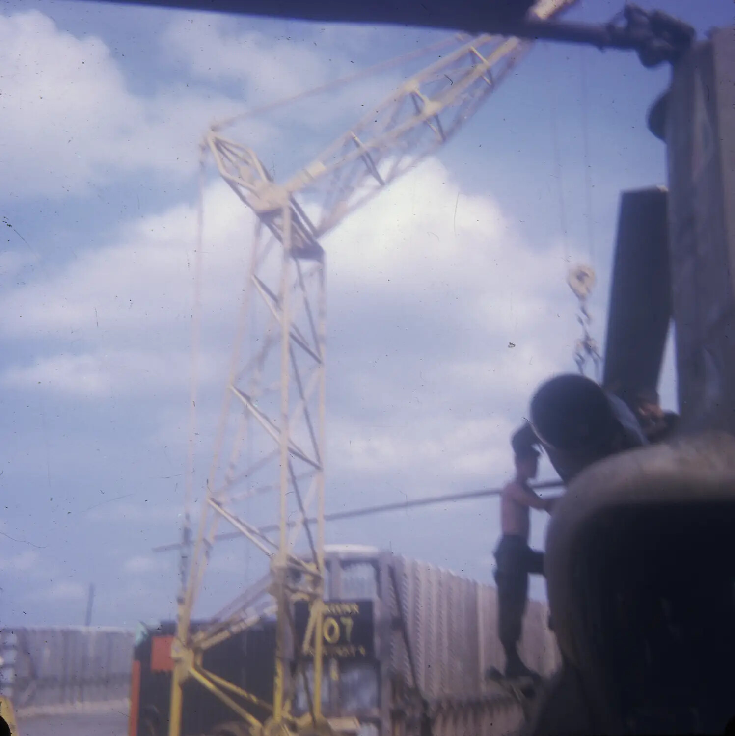 Mobile Crane and Construction Personnel at a U.S. Military Site, Vietnam War Era