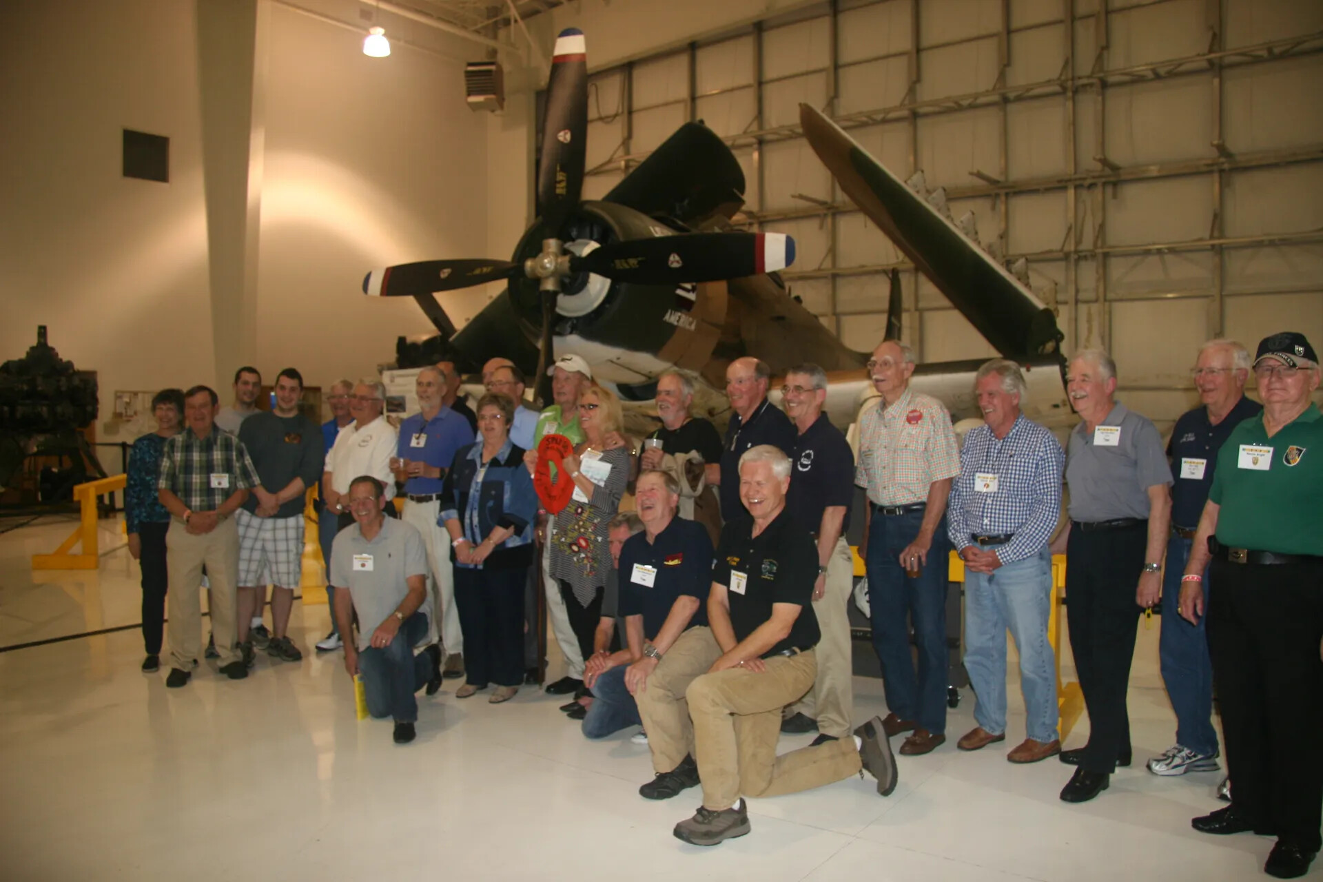 Operation Tailwind Reunion Group Photo Before A-1 Skyraider, 2016