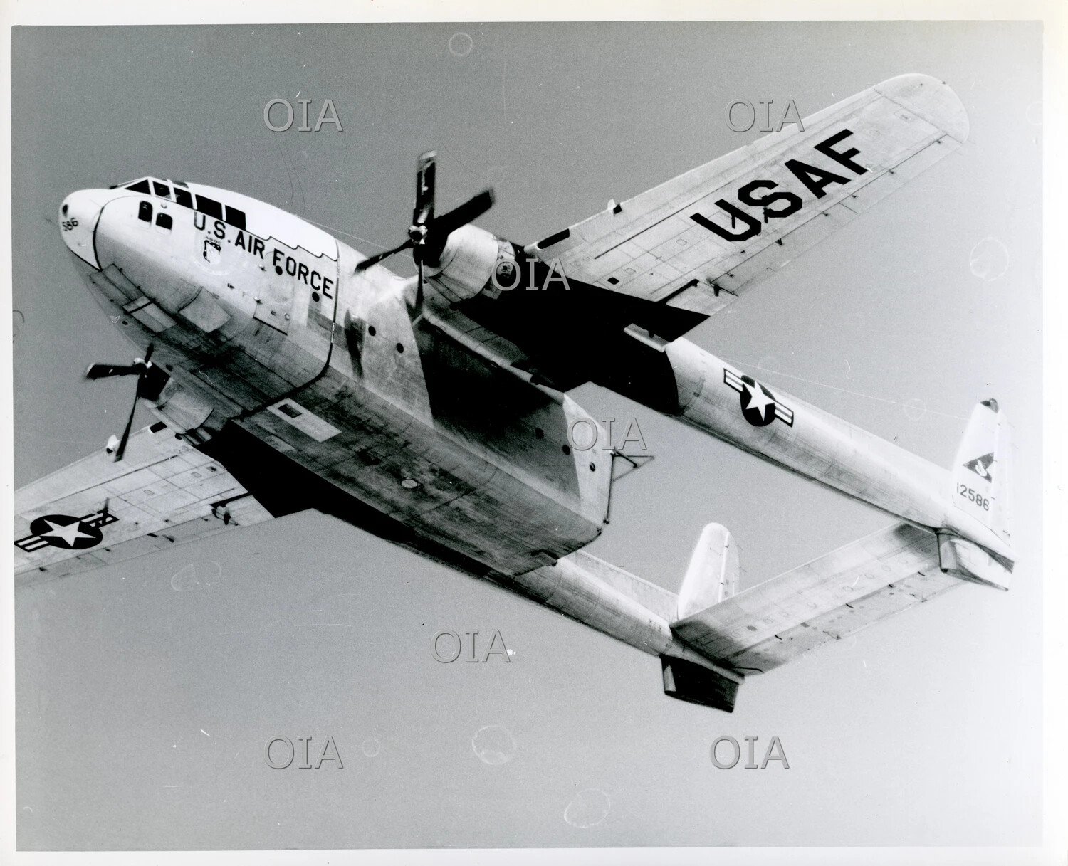 Fairchild C-119 'Flying Boxcar' USAF Cargo Aircraft in Flight, Banking Maneuver