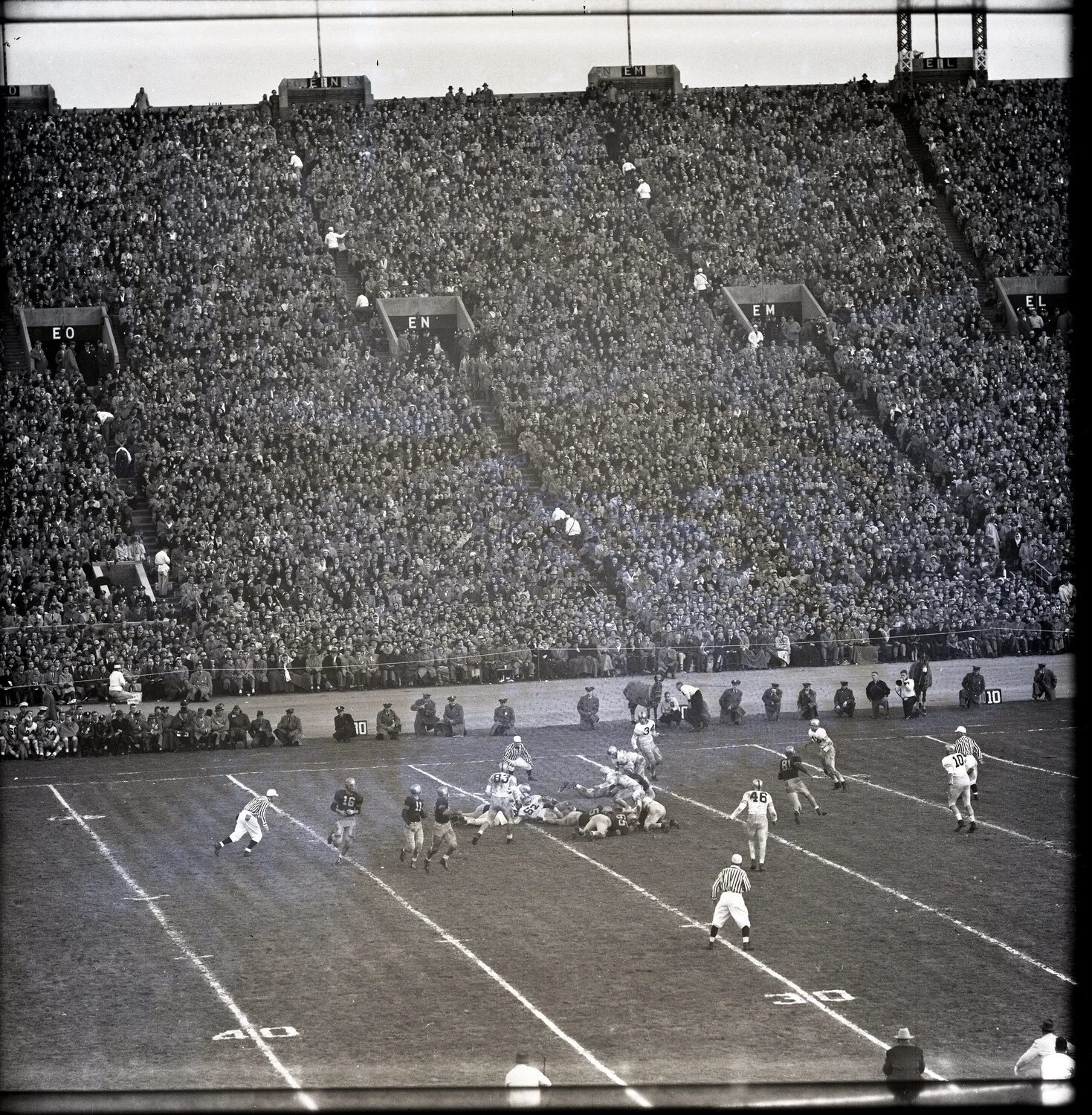 Army-Navy Football Game - Sweep Play Toward the Sideline, Municipal Stadium