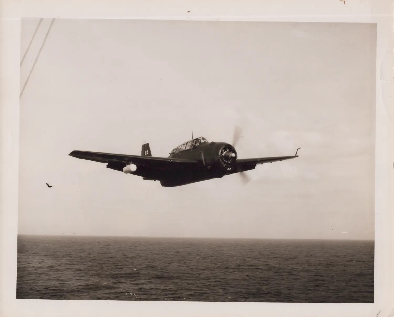 TBM/TBF Avenger Torpedo Bomber No. 84 in Flight Over the Pacific