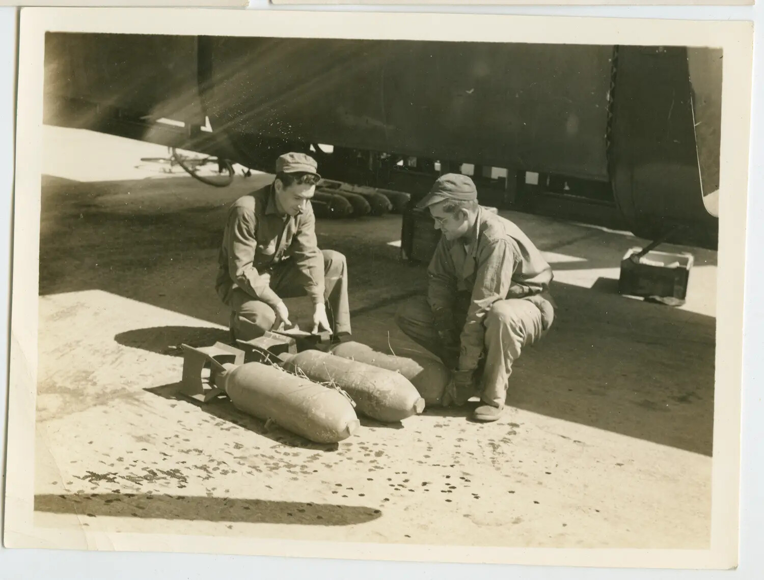 WWII Ground Crew Loading 500 lb General Purpose Bombs, 392nd Bomb Group, Wendling Airfield, England, 1 September 1944