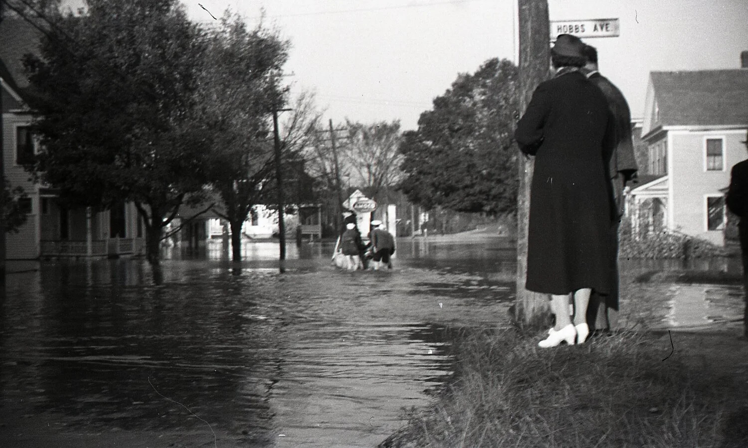 Flooded Hobbs Avenue with Onlookers and Amoco Sign, Nashua, New Hampshire, September 1936