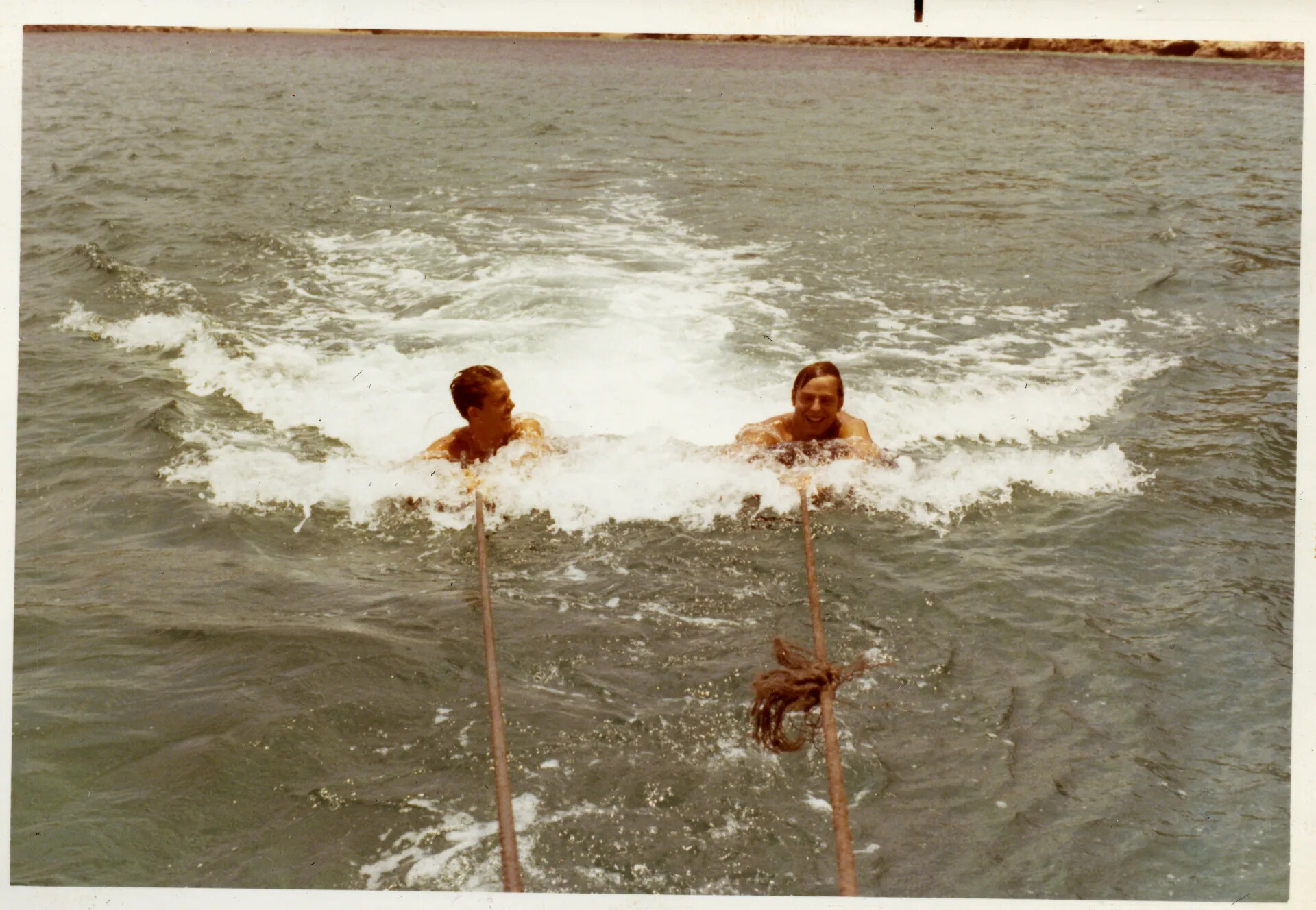 Airmen Swimming/Being Towed in River Near Nakhon Phanom RTAFB, Thailand