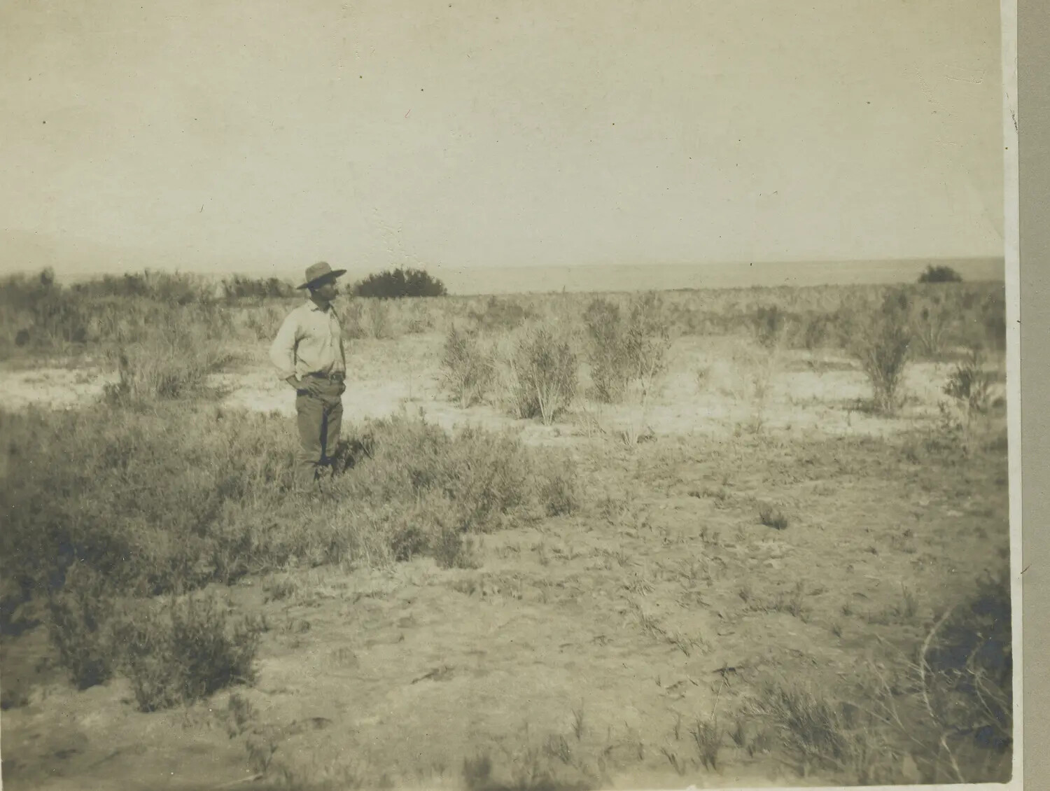 Man Standing in Scrubland, Possibly Philippines, Late 19th Century