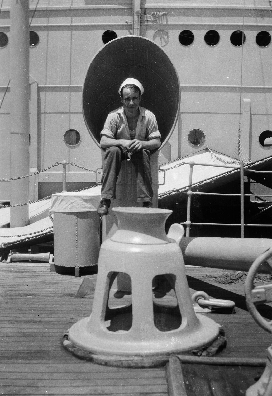 Sailor Seated in Ship's Ventilator Cowl, US Asiatic Fleet, China Station, 1930s