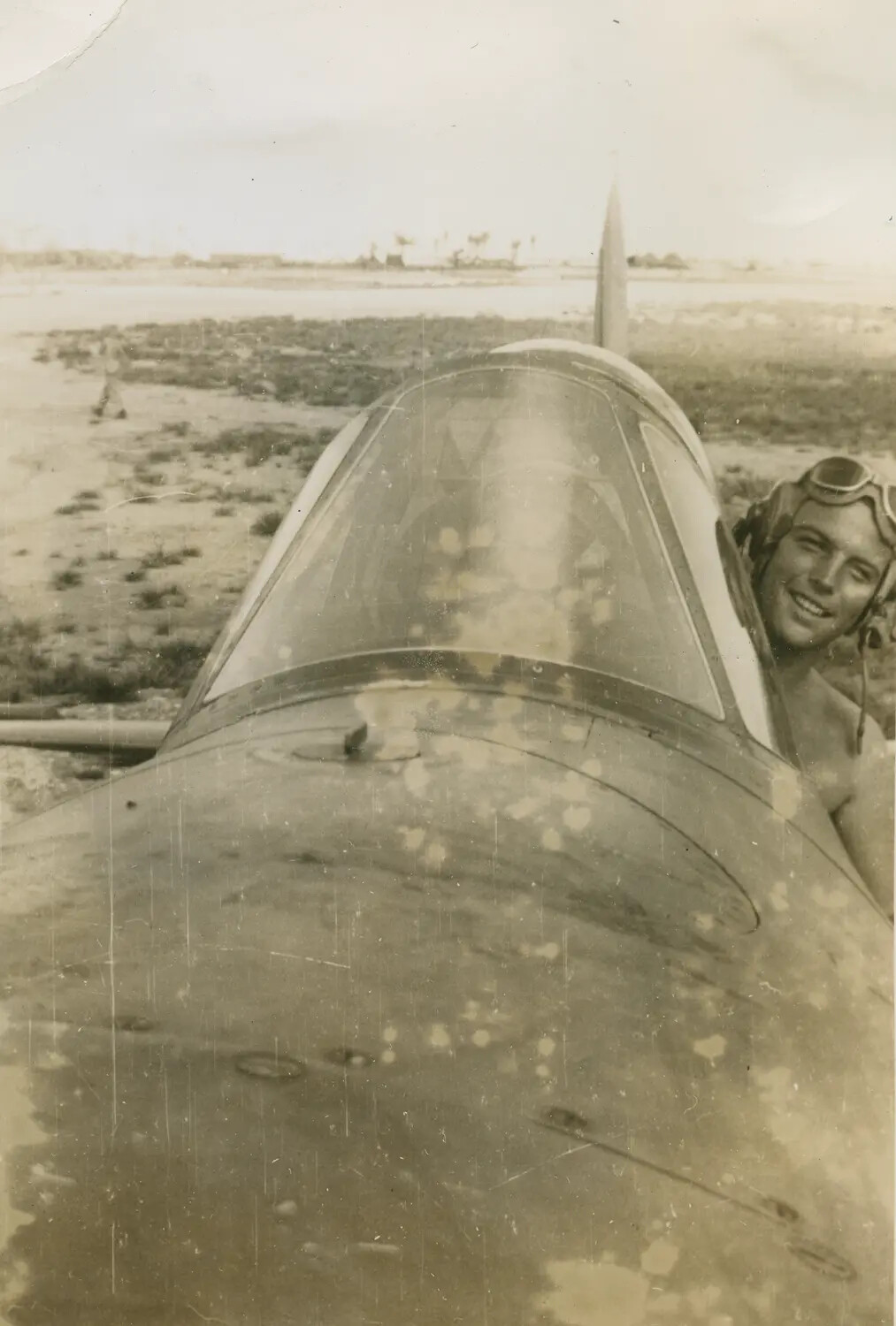 Marine Aviator Leaning from Aircraft Cockpit, Edward P. McAleer Photo Album, WWII