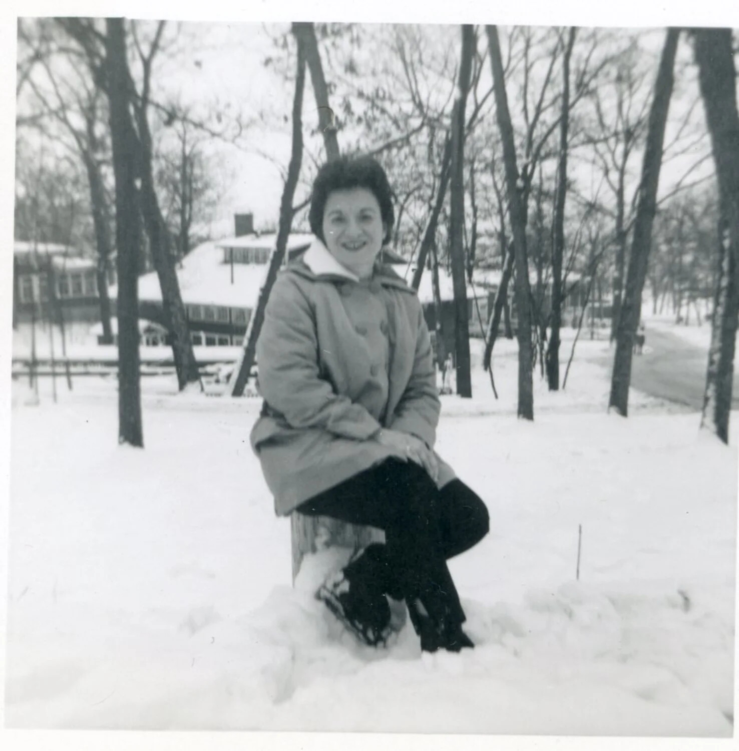 Woman Seated on Tree Stump in Snow, Winter Family Photograph