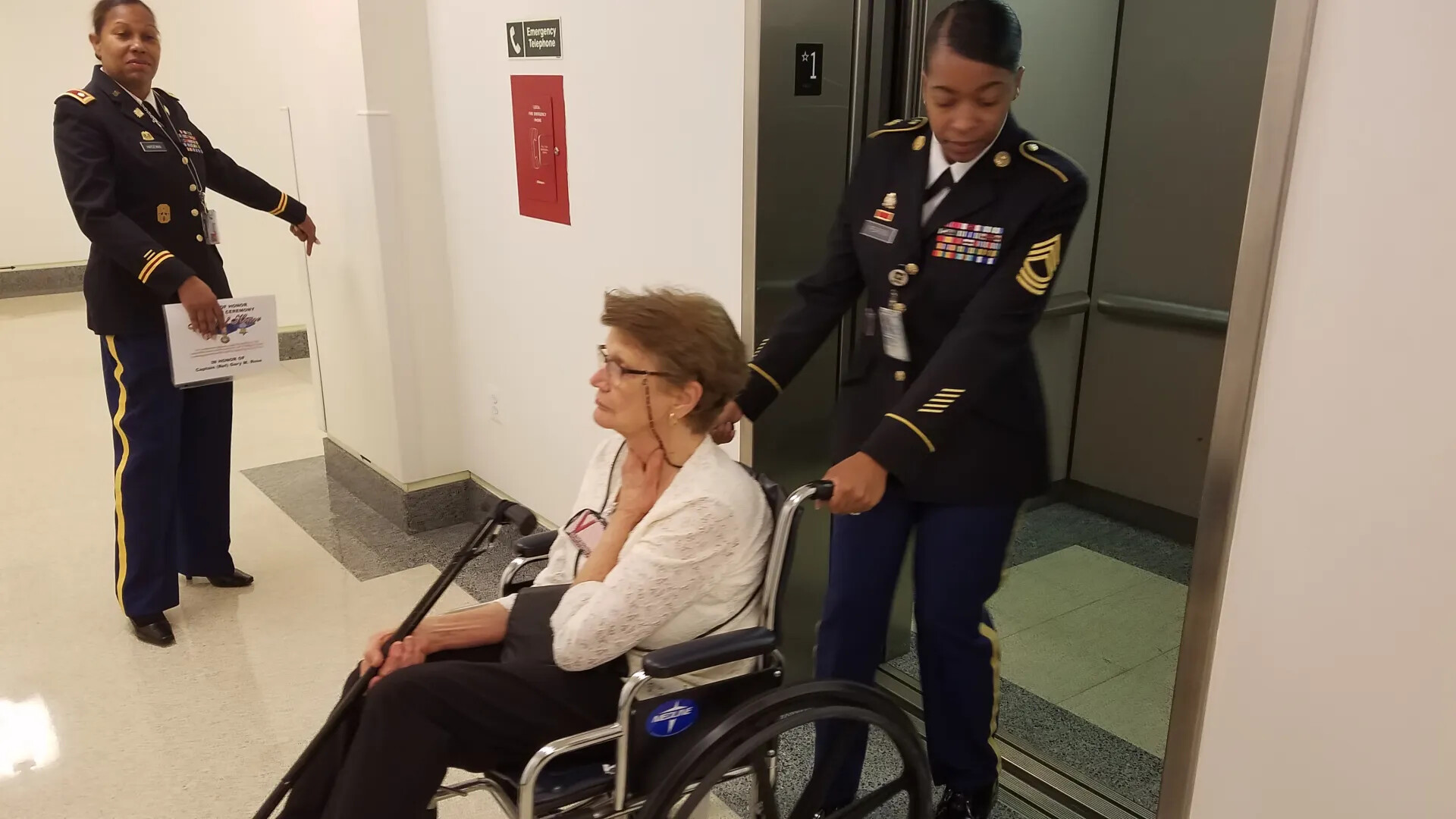 Elderly Woman Assisted by Army Soldiers Following Gary M. Rose Medal of Honor Ceremony, Pentagon, October 24, 2017