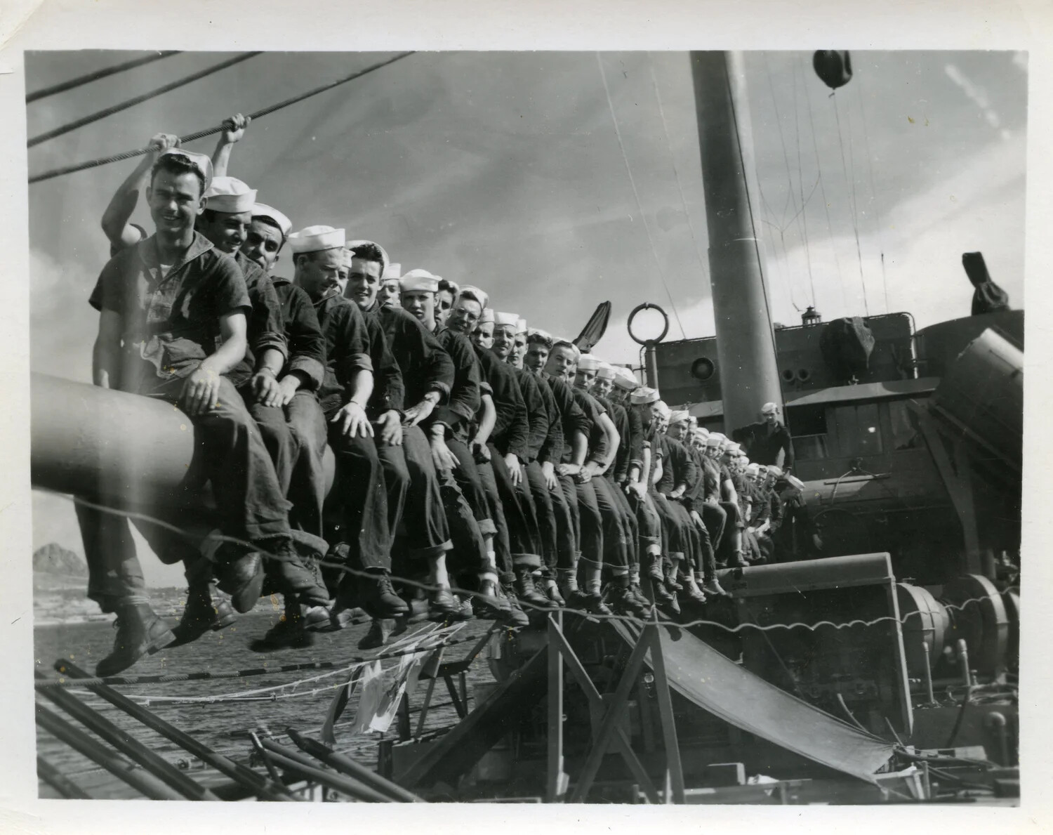 Sailors Riding a Main Battery Gun Barrel, U.S. Navy Warship, Pacific Theater, WWII